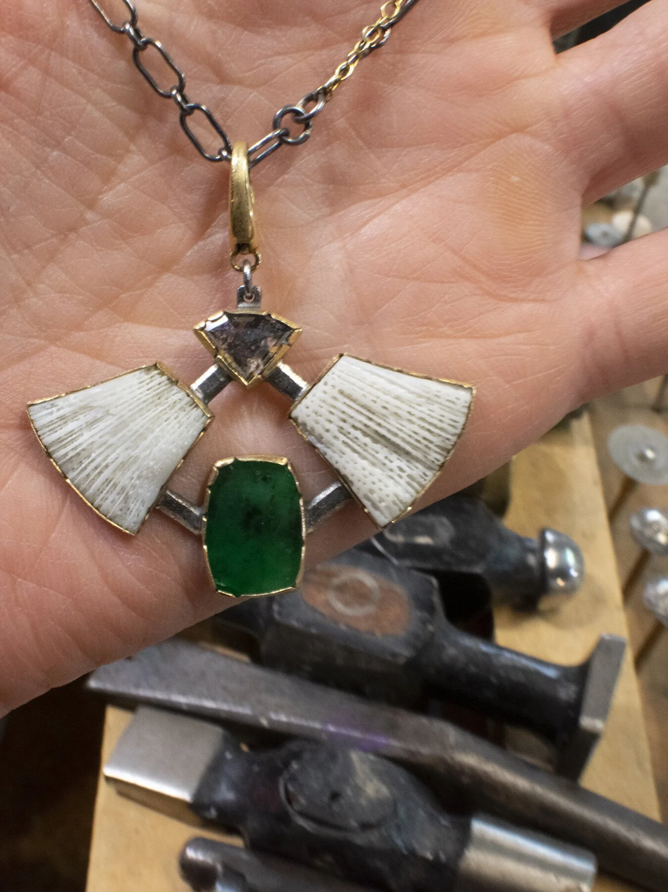 emerald pendant with hammers.jpg