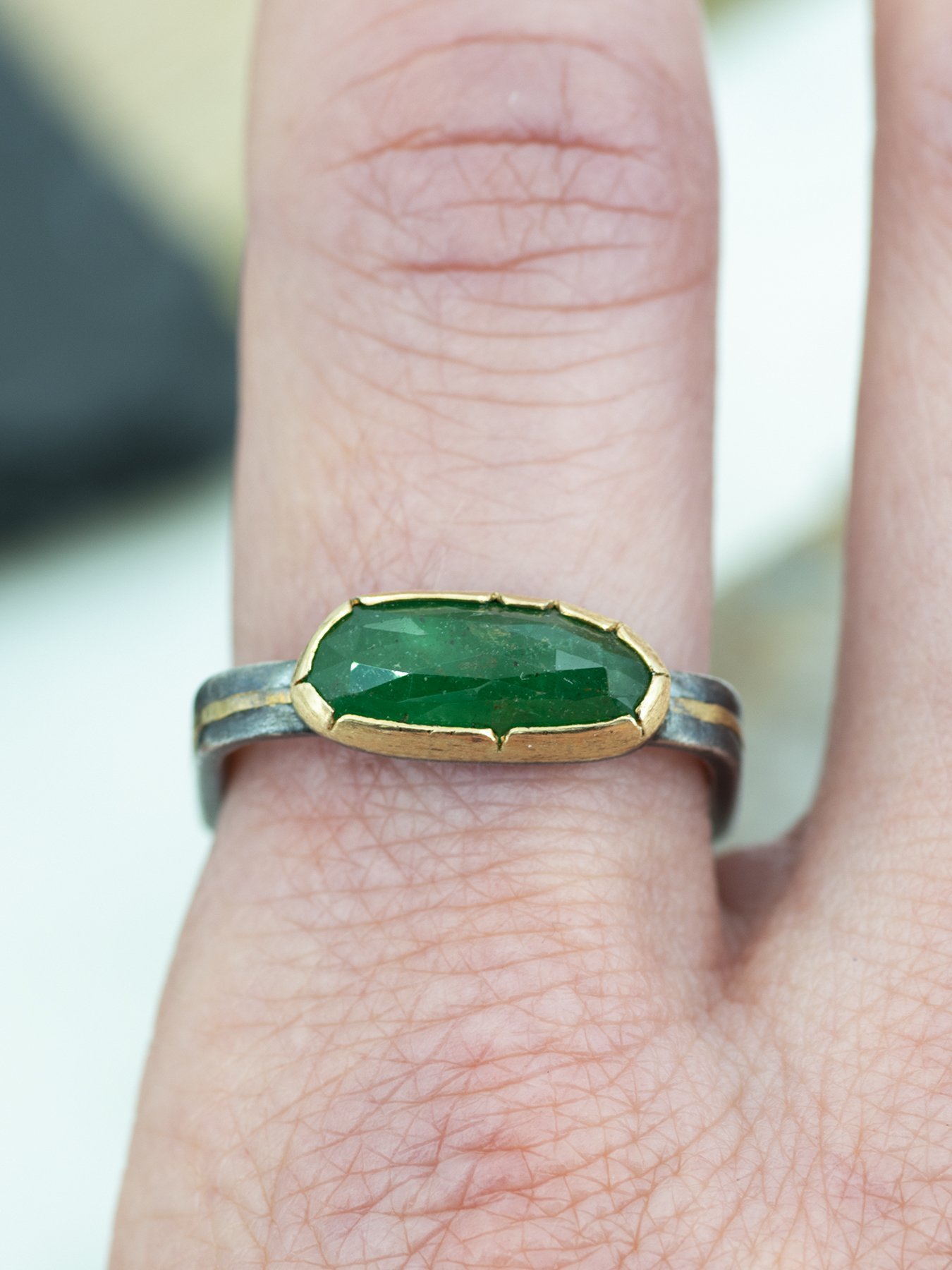 Long Oval Emerald Square Band with Gold through Band on.jpg