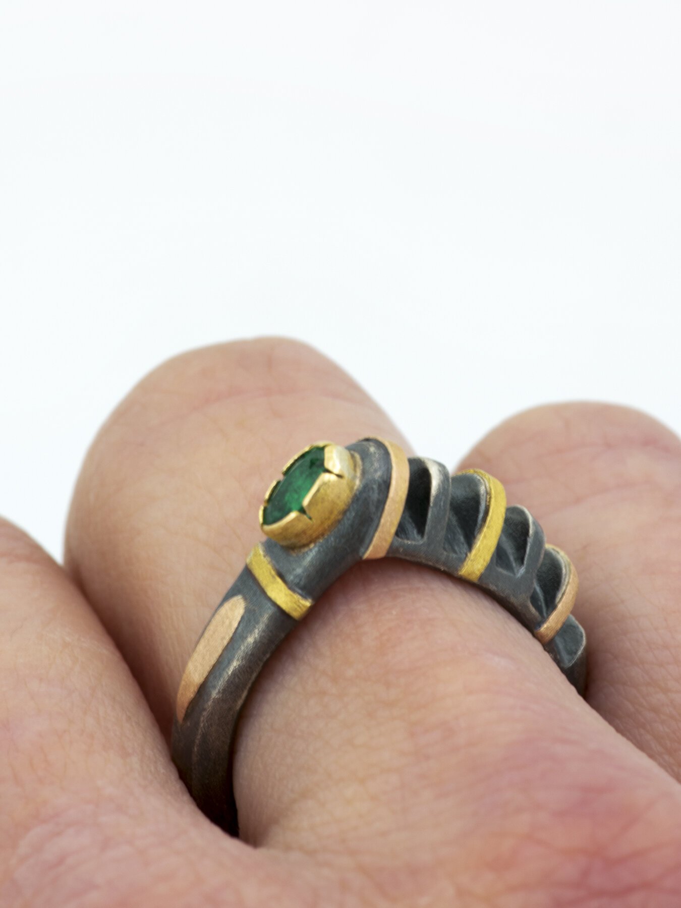 Cut Ring with Oval Emerald on hand 3.jpg