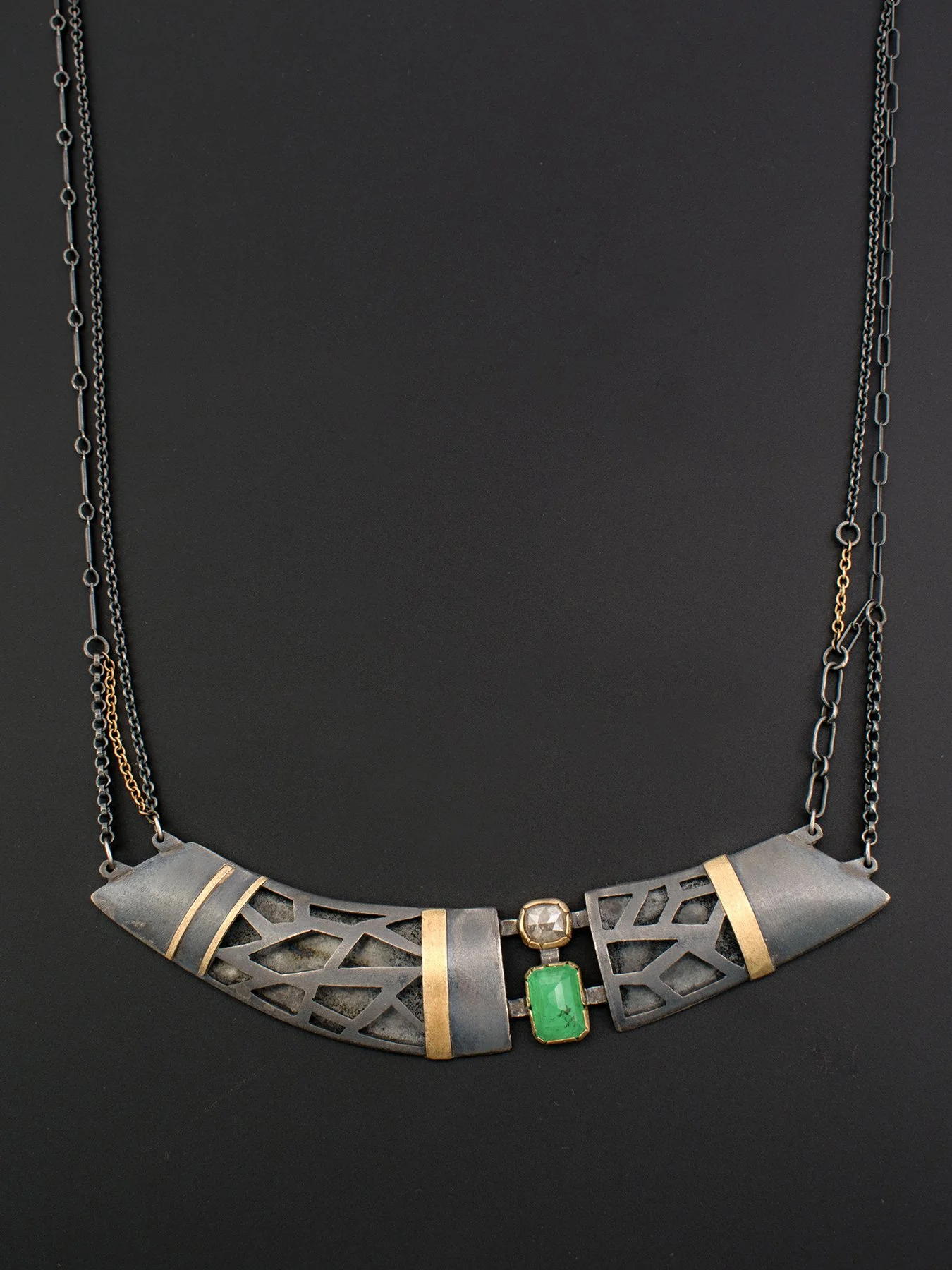 Asymmetric Diamond and Emerald Abstract Geometry Pierced Necklace on black copy.jpg