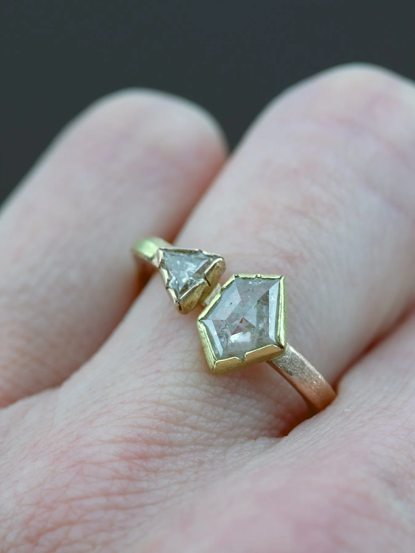 Shield Shaped Diamond and Trillion Diamond on a Square Band Ring on.jpg