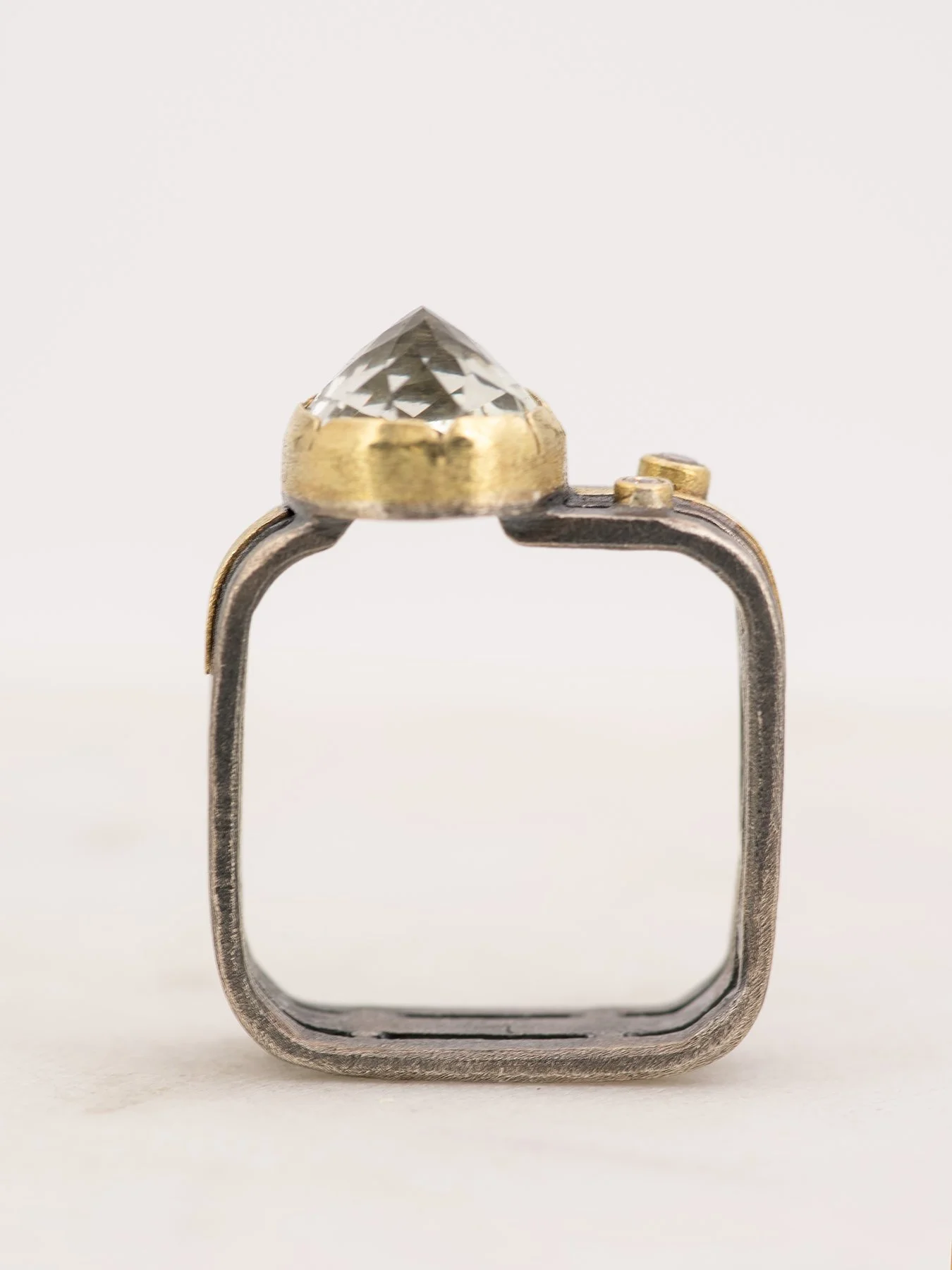 Oval Green Amethyst and 2 Diamonds on a Triple Square Band 2.jpg