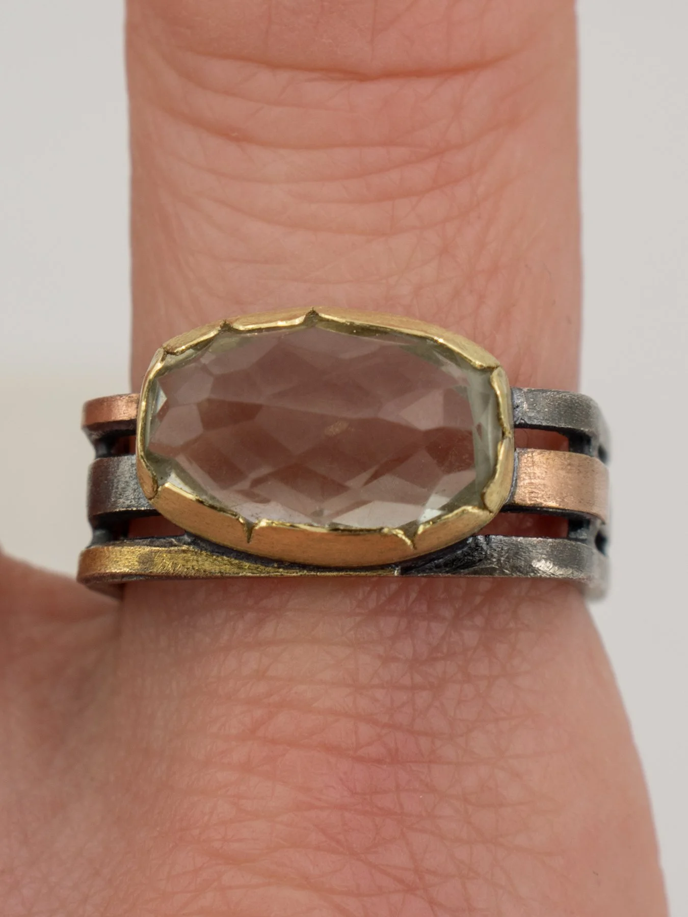 Curved Rectangle Green Amethyst on a Triple Square Band on.jpg