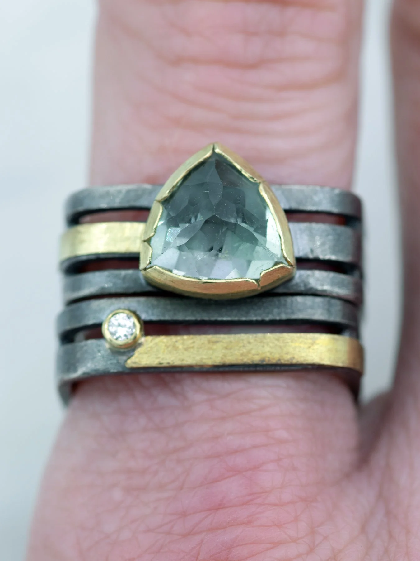 Triangle Green Amethyst on a Triple Square Band on stack.jpg