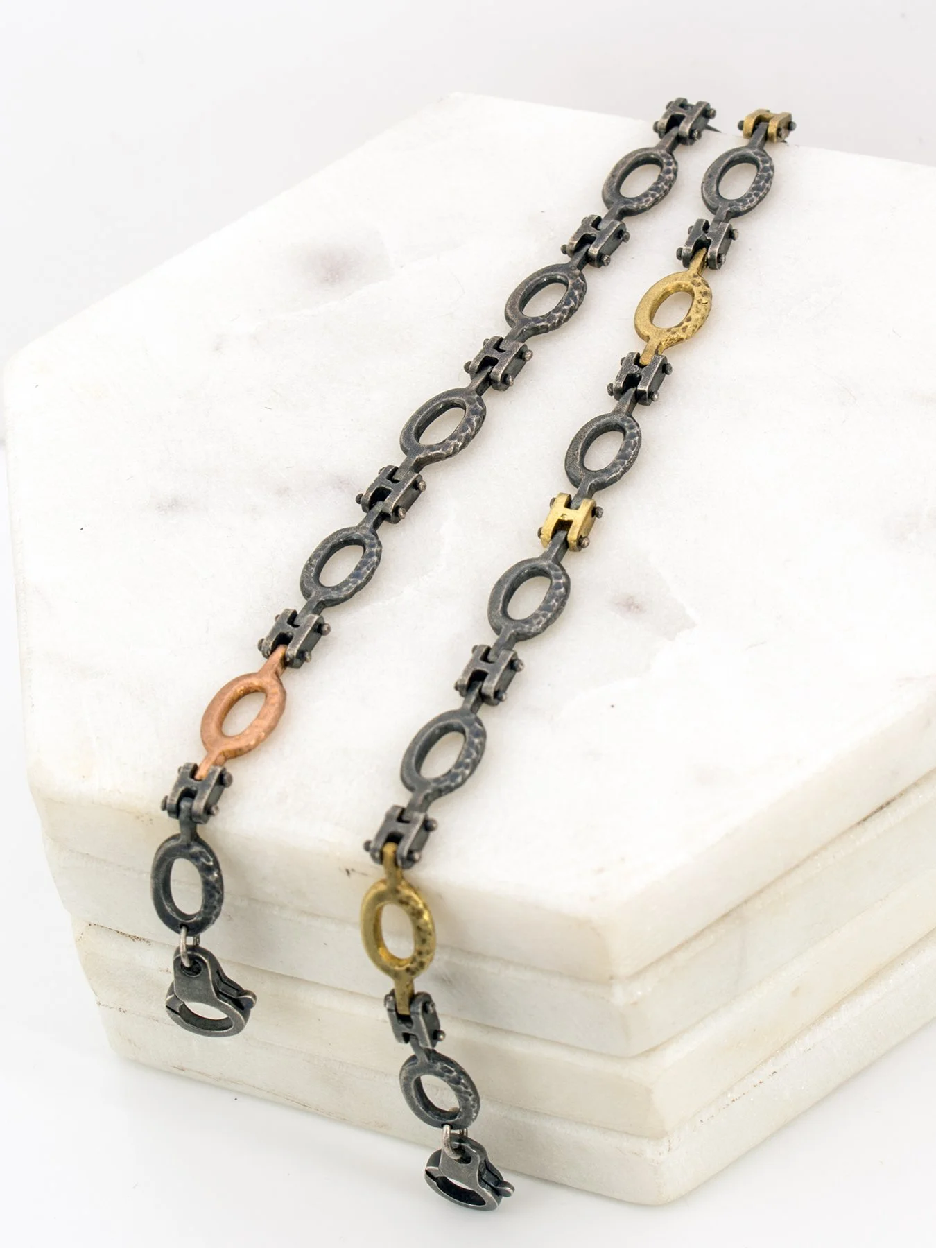 Textured Hinged Bracelet with mixed silver and gold links 1.jpg