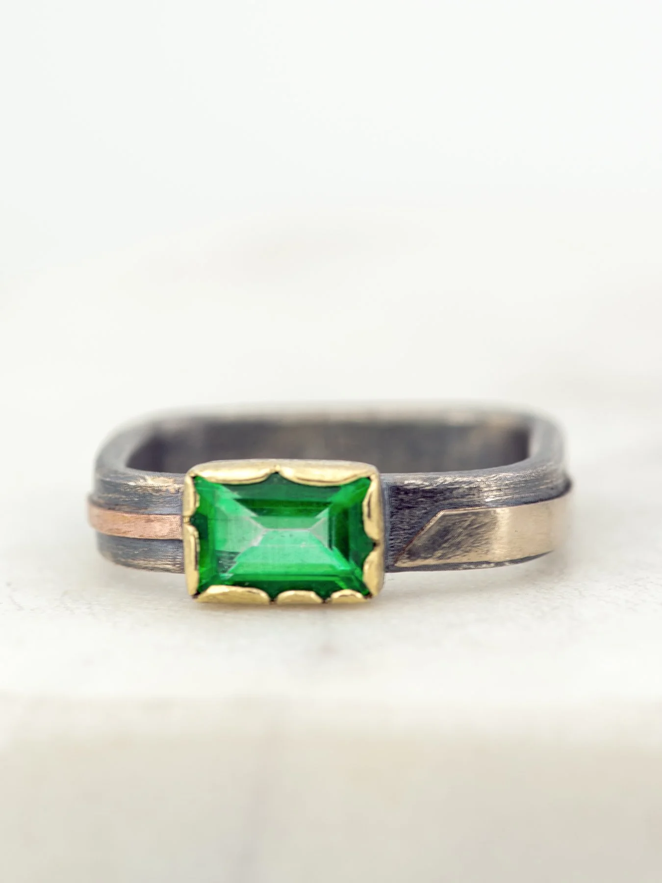 Fancy Emerald on a 4mm Square Band Ring 1.jpg