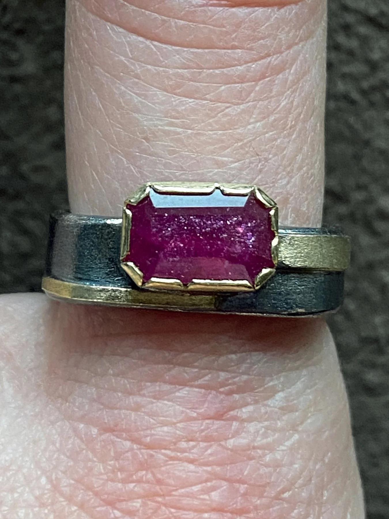 fancy-ruby-on-a-6mm-square-band-ring-on-65afe9e717f4e.jpg