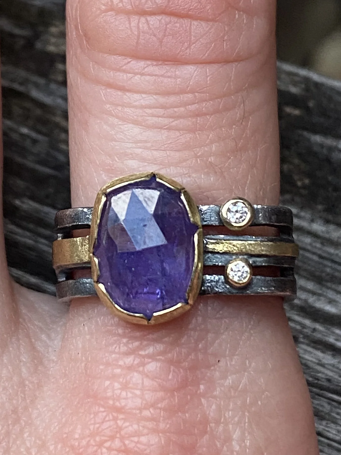 Tanzanite and Diamonds on a Triple Band Square Ring on.jpg
