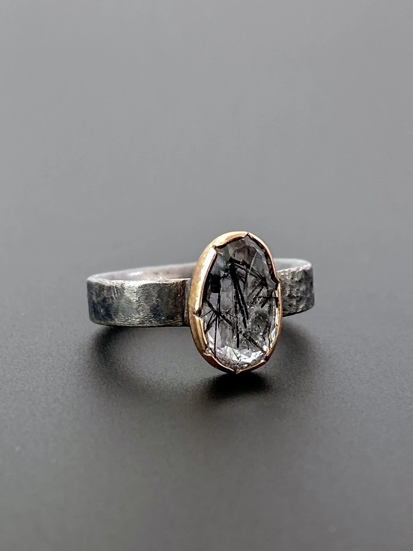 Oval Tourmalinated Quartz on an Round Textured Band 2.jpg
