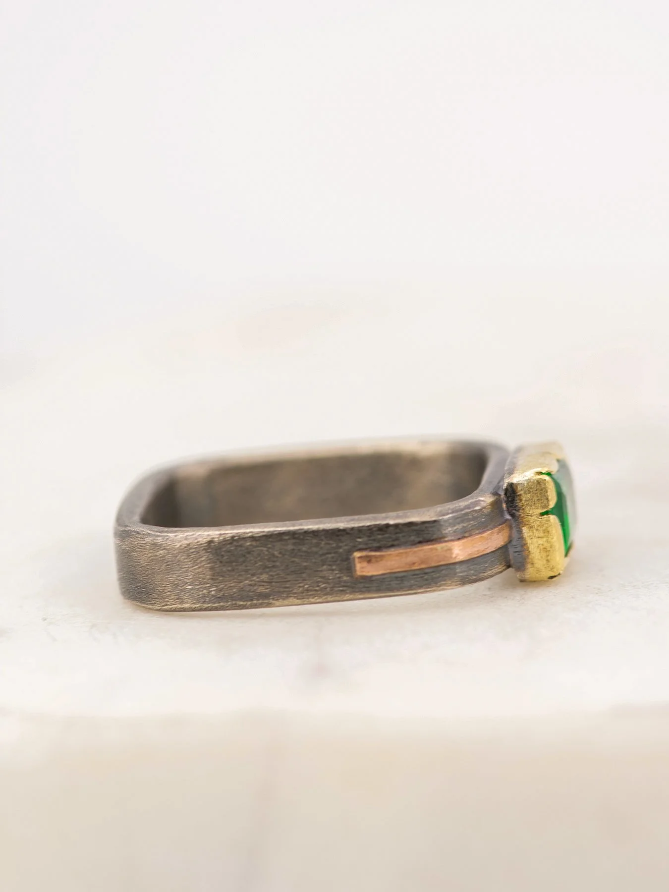 Fancy Emerald on a 4mm Square Band Ring 3.jpg