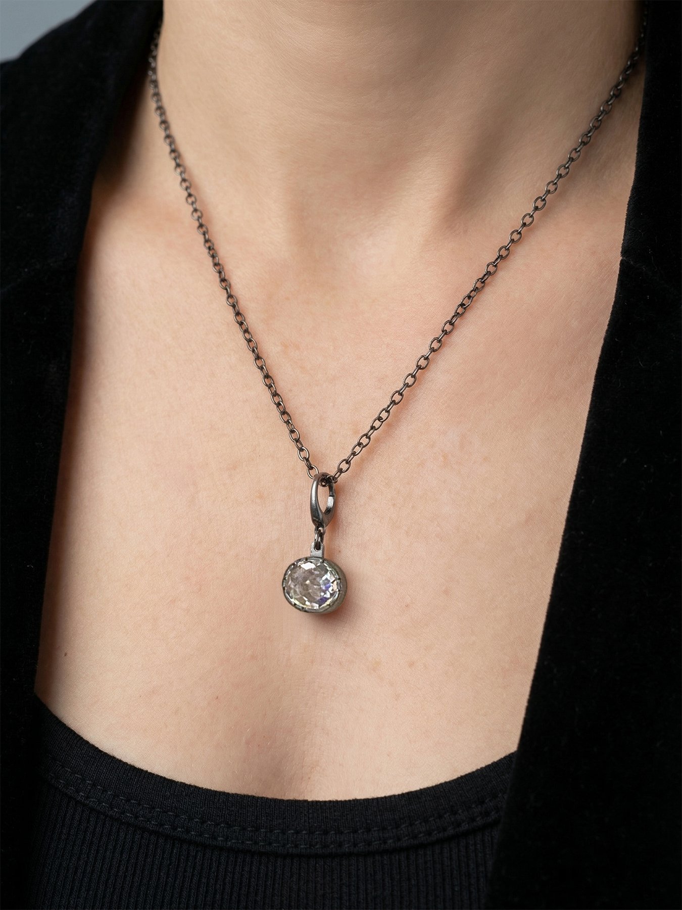 White topaz pendant on model.jpg
