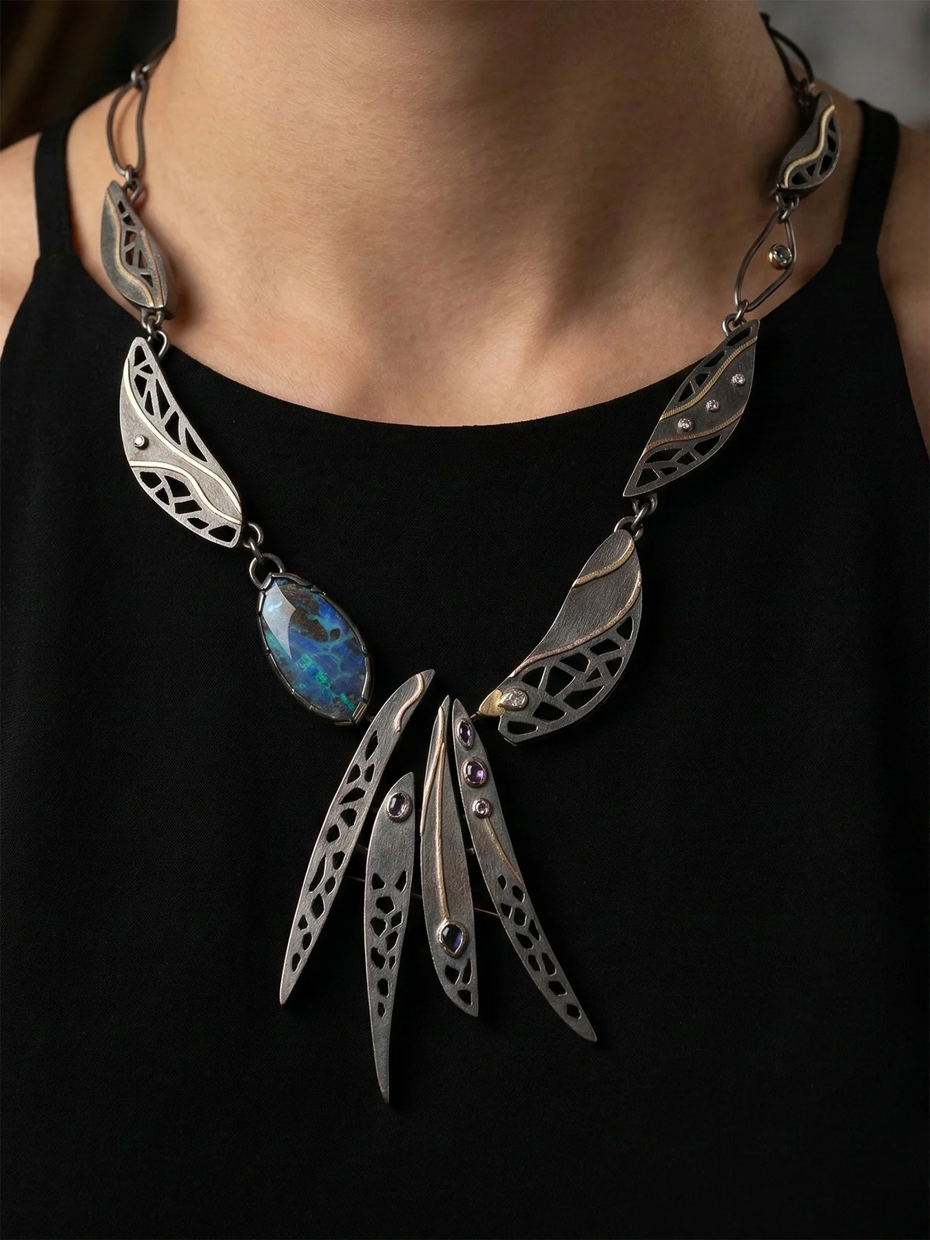 Pierced Necklace with Opal and DIamond with added Wing Pin on model.jpg