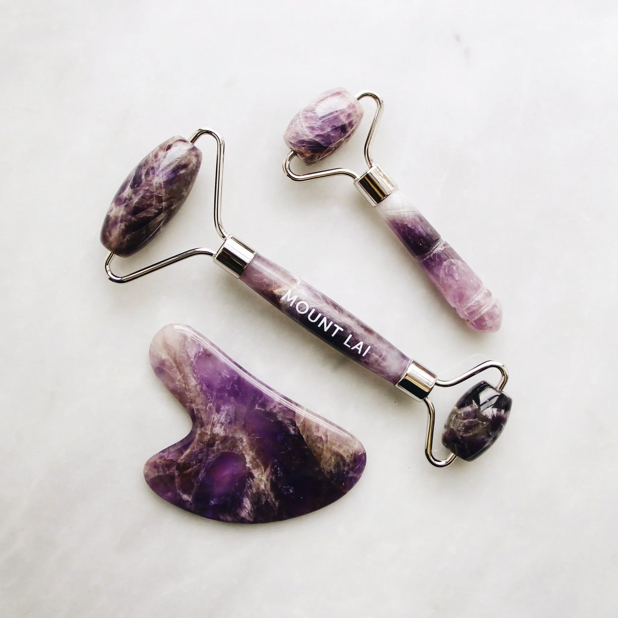 The Amethyst Gua Sha Facial Lifting Tool.jpeg