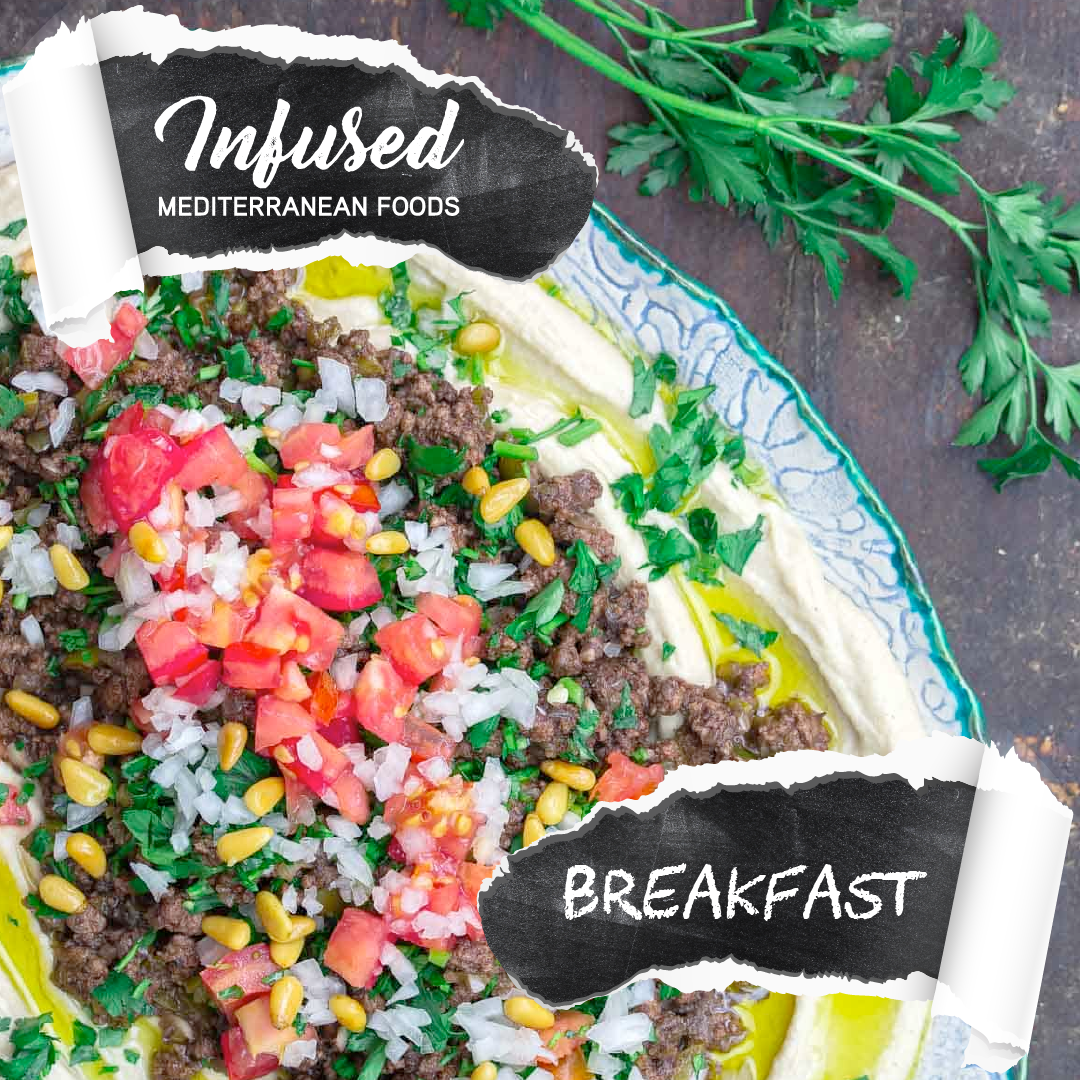 A plate of Mediterranean-style breakfast food with ground meat, chopped tomatoes, onions, herbs, and hummus, garnished with parsley and pine nuts.