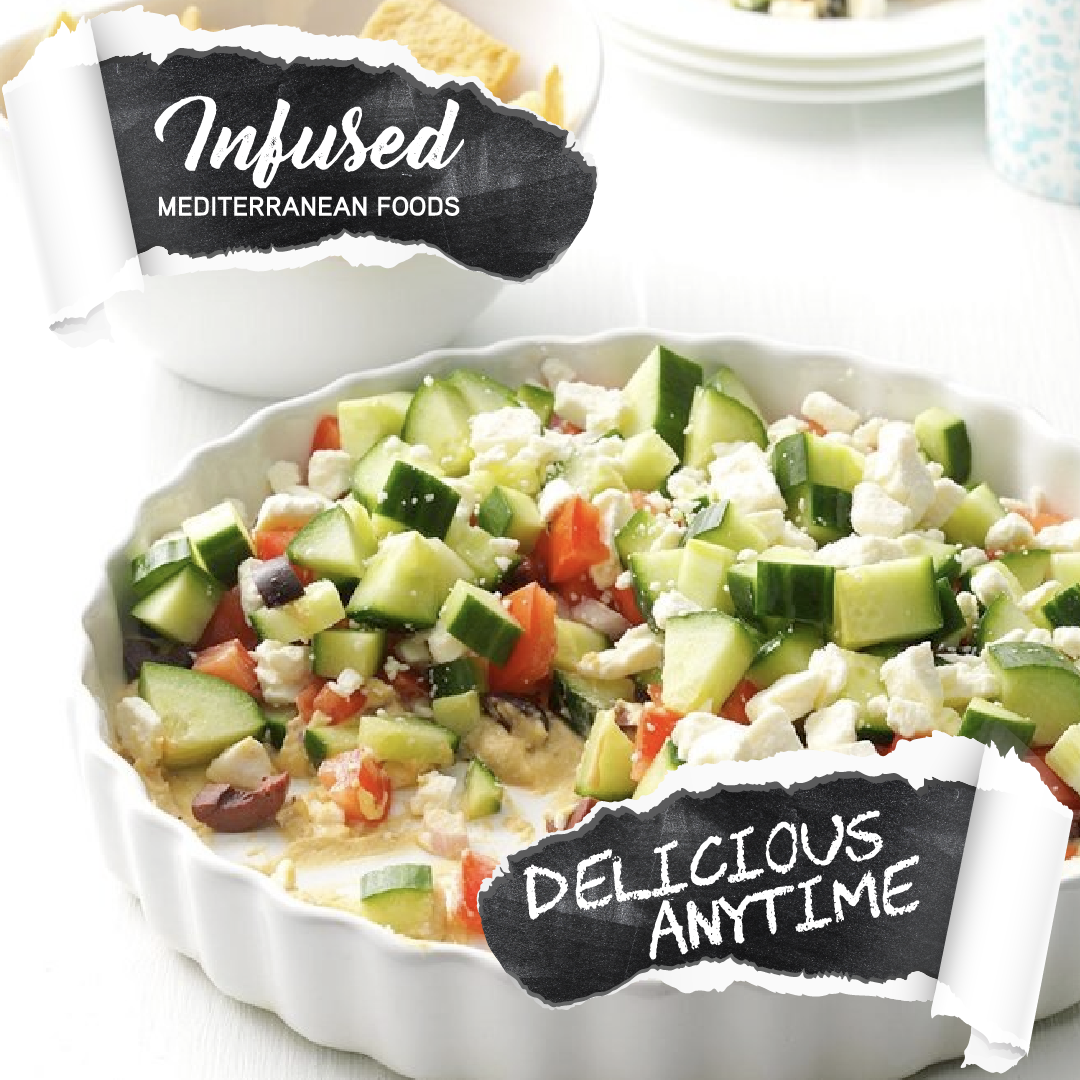 A Mediterranean vegetable salad with cucumbers, tomatoes, black olives, feta cheese, and possibly other ingredients in a white bowl, with text overlays saying 'Infused Mediterranean Foods' and 'Delicious Anytime'.
