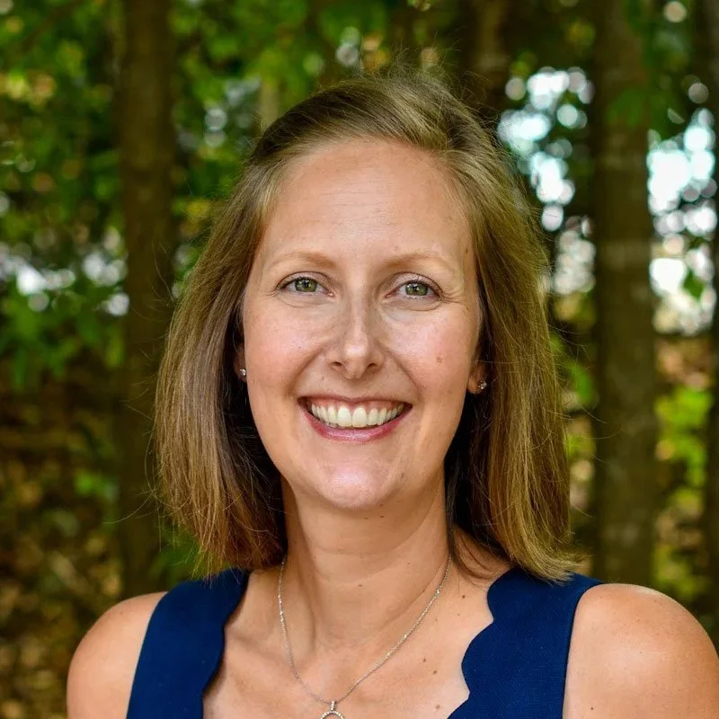 Kristin Nakhla, Holistic, Christian Counselor for women and teen girls smiling outside the Cary office.