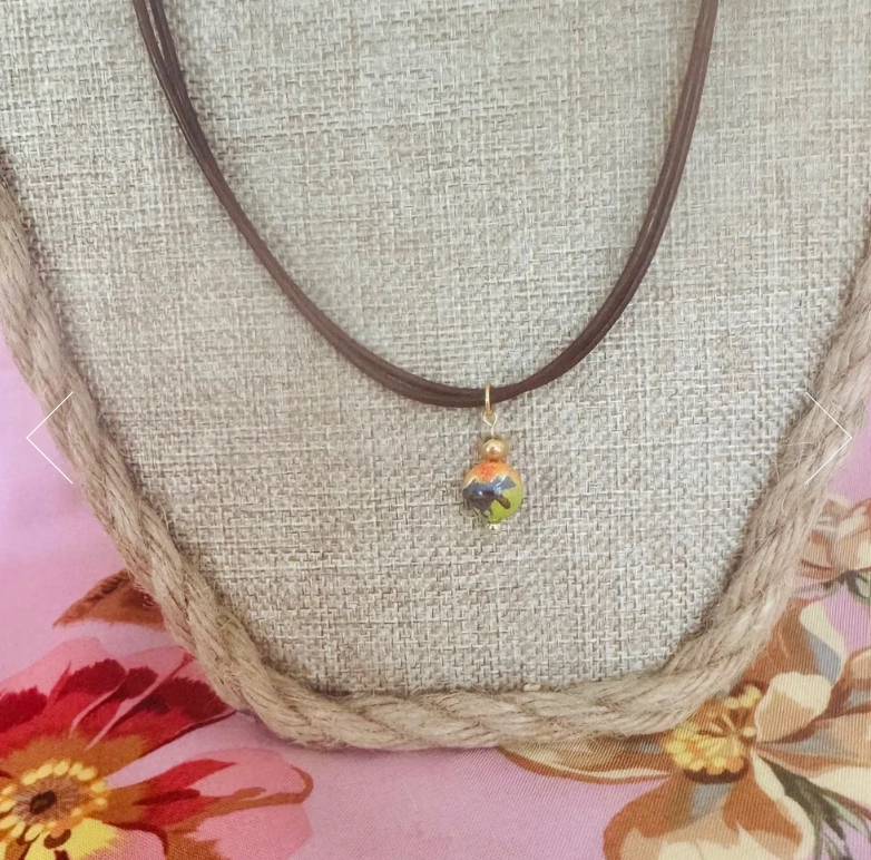 Chiquita.gold.necklace.2.png