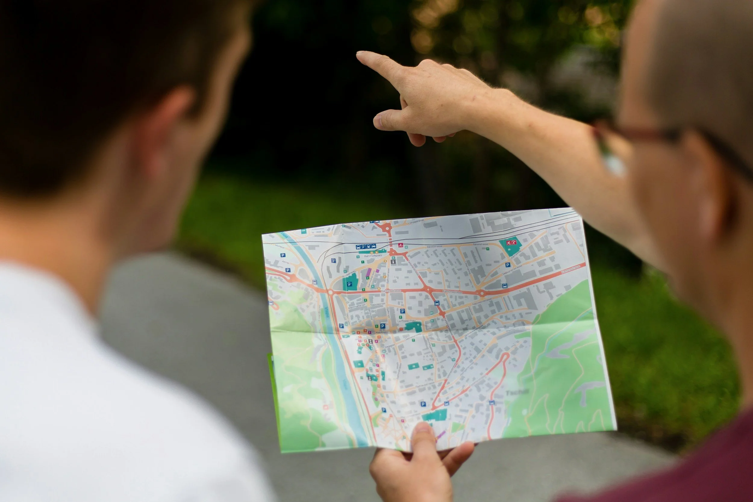 Image of woman looking at map trying to search for something