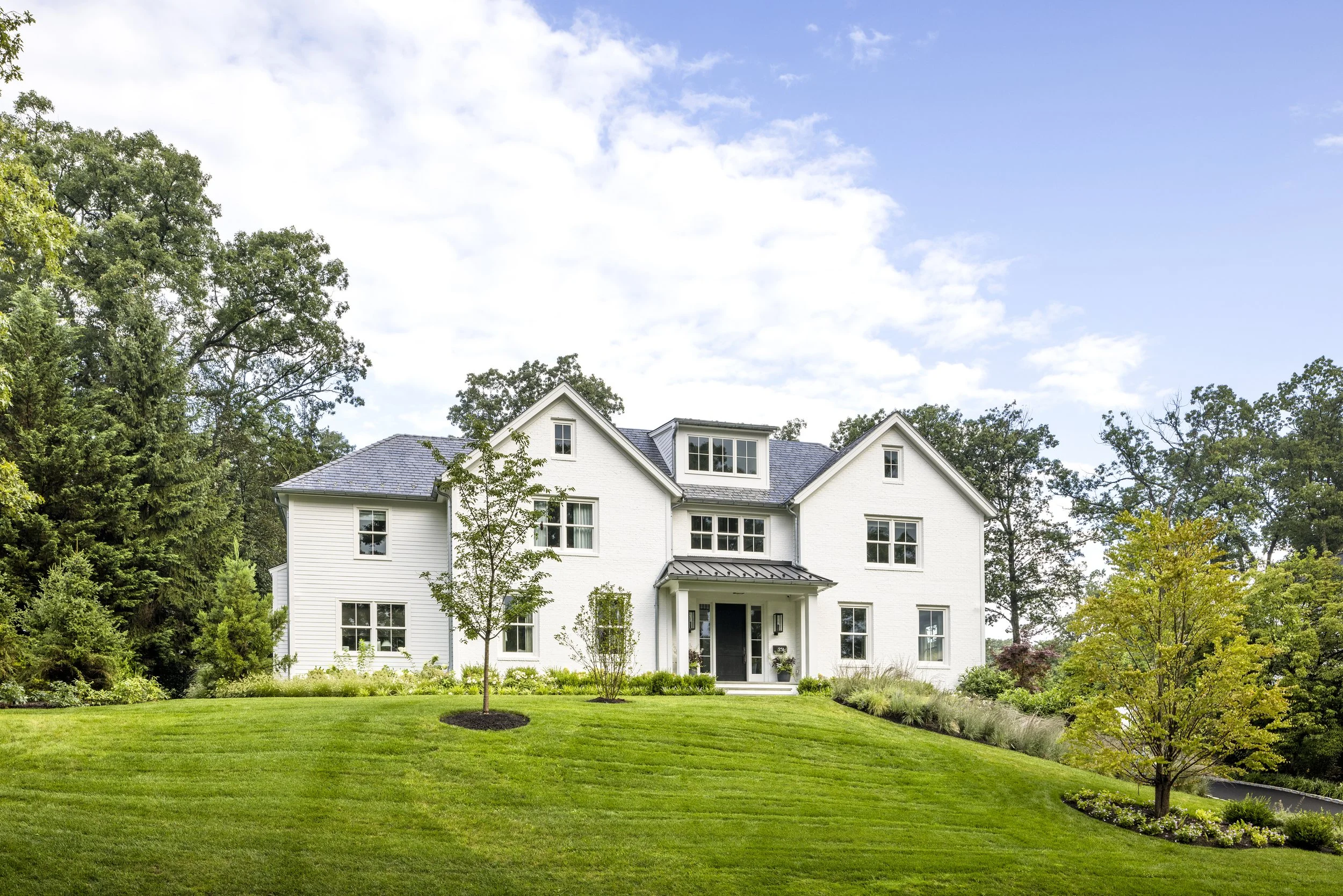 Painted Brick Slate Roof House