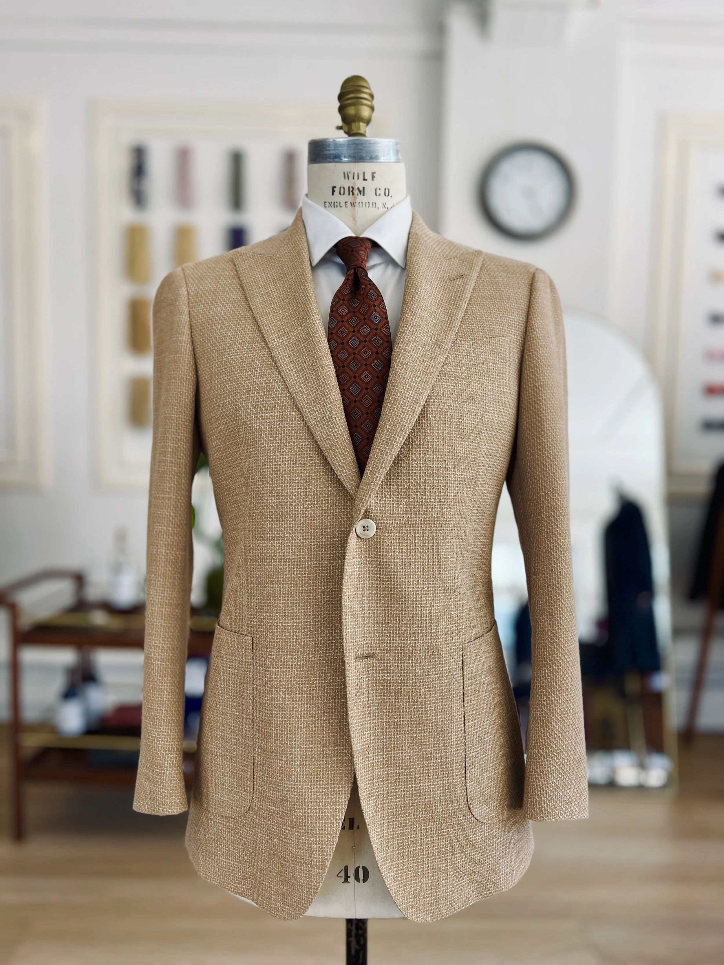 $630 (Original $2,100) / 44 R / 44% cotton 22% Wool 17% Silk 17% Linen / Light and Breezy