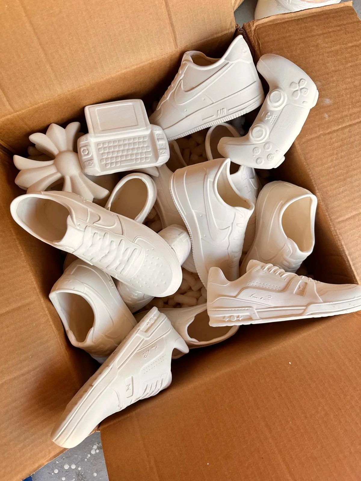 Box of bisques of nike shoes, miu miu bag, ps5 ,