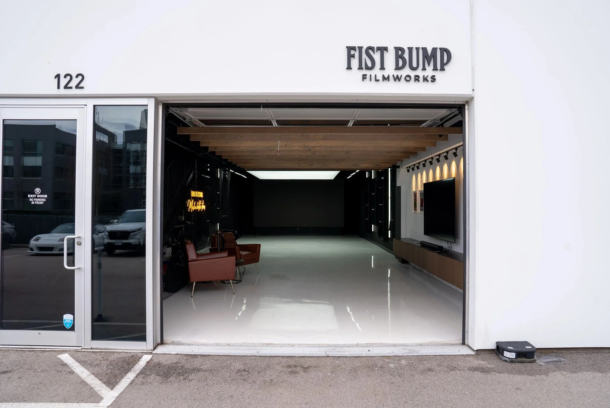 Fist Bump Studio street level entrance at 122-13880 Wireless Way