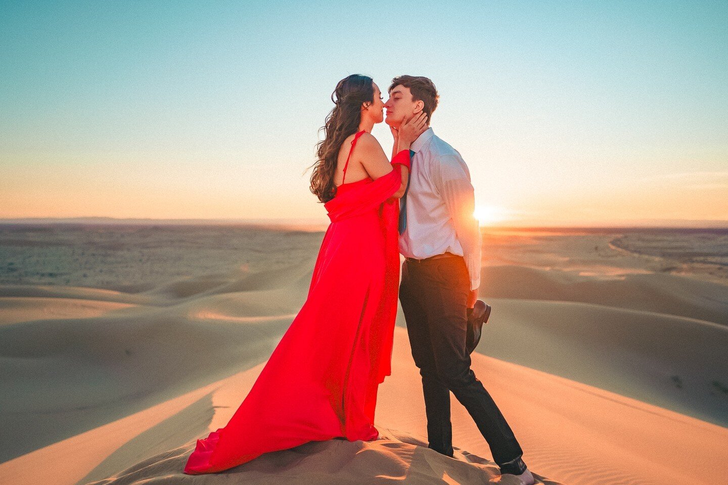 Embarking on a visual odyssey with John + Ewelina's engagement shoot! 🌄 Their love story unfolds like a cinematic masterpiece. 🏜️✨ Armed with a drone, we soared to capture their tale from new heights, embracing the challenge of relentless winds. De