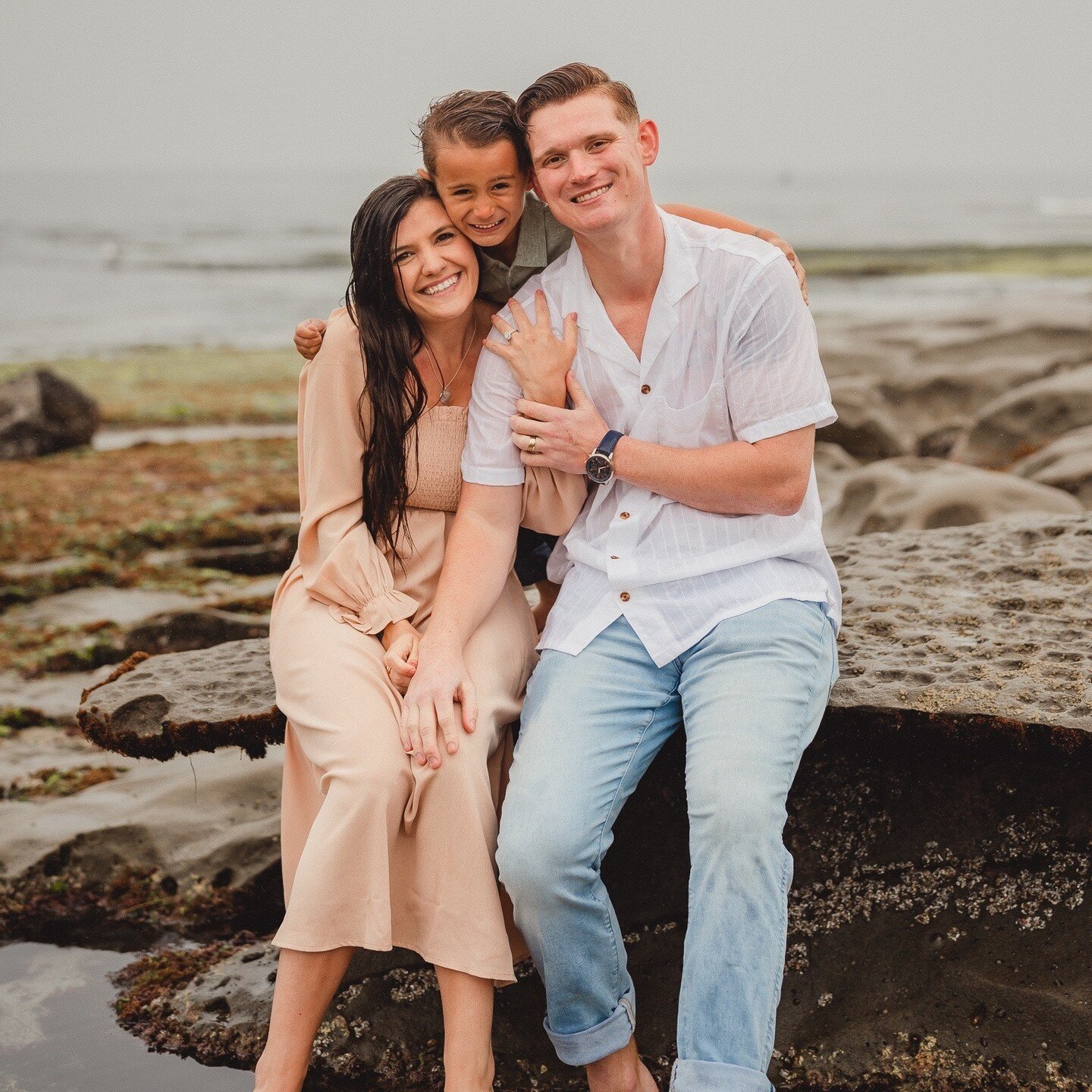 Caught in the rain with Miranda + Jake during their engagement shoot at La Jolla Tidepools. ☔️ Featuring their awesome son and embracing the unexpected with an OhPg shoot in the rain. Real moments, real fun. Here's to love that weathers any storm! 💑