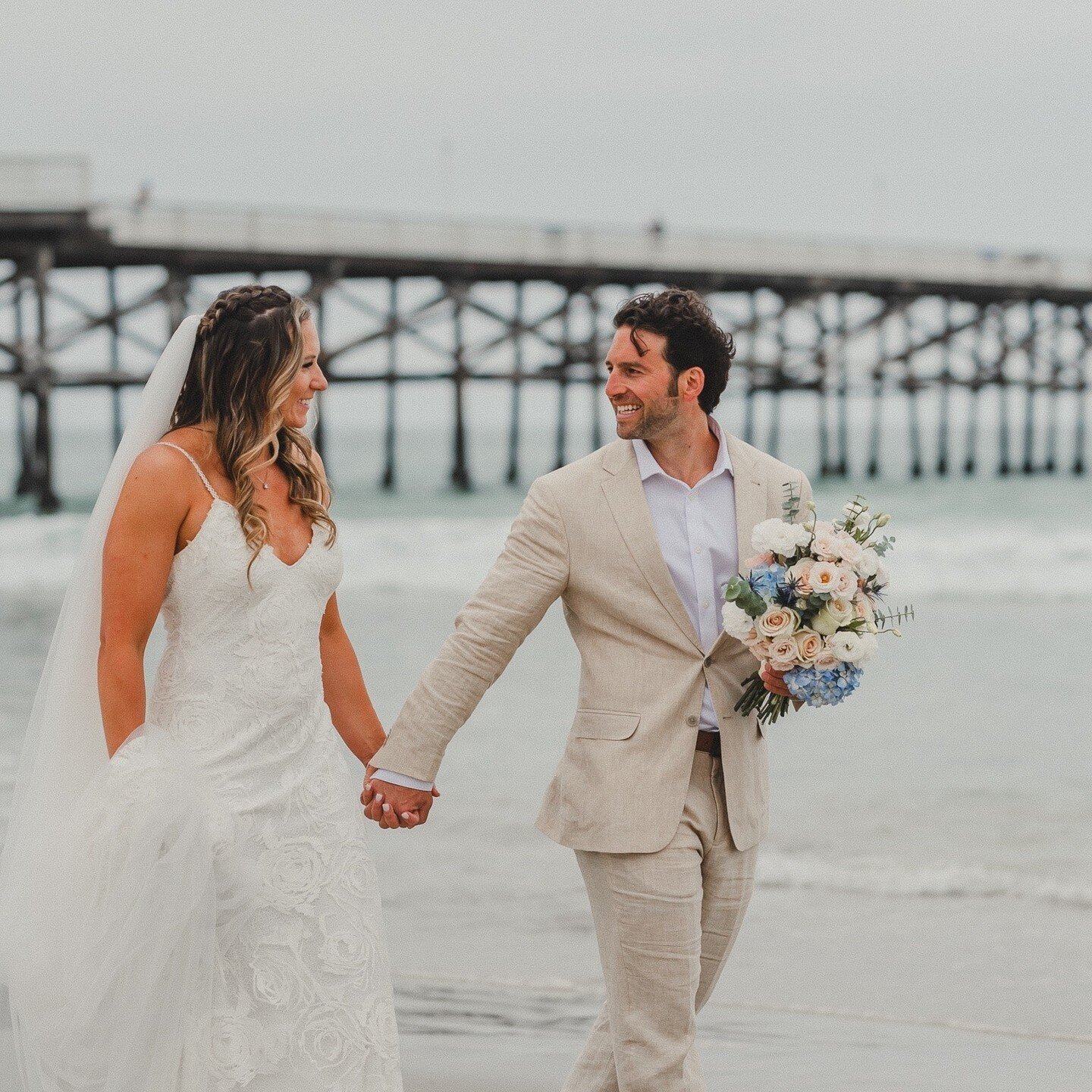Dive into the coastal love story of Casey + Mike's 2023 wedding at Tower 23, Pacific Beach! 🌊 East Coast vibes met West Coast dreams. 'Bouquets and Beer-quets' added a touch of whimsy to the celebration. Shot on the incredible Nikon Z6, every frame 