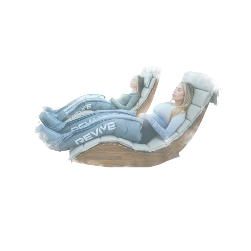 Two women are reclining in zero gravity lounge chairs with adjustable headrests.
