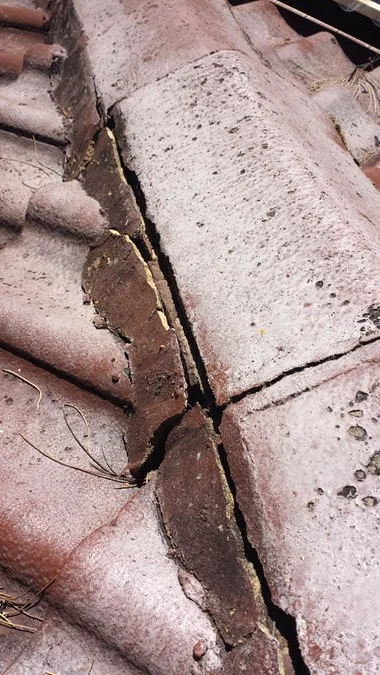 cracked ridge capping tiles.jpg