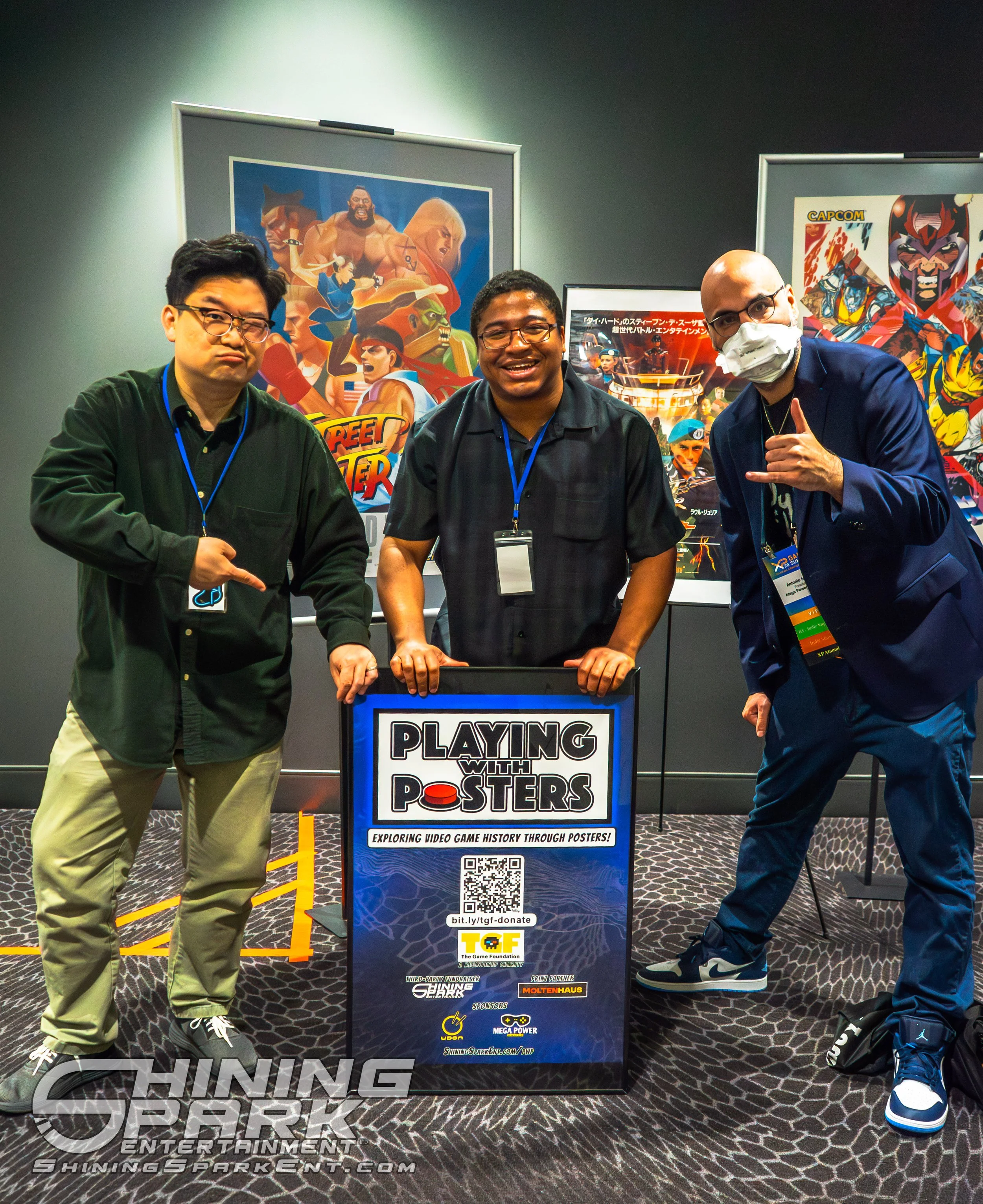 Canadian Game Awards 2026 - Photo with Playing With Posters co-founders Dixon Wu and Jordan Sparks and Antonio Miceli (right) of Mega Power Games, a sponsor of the exhibit.