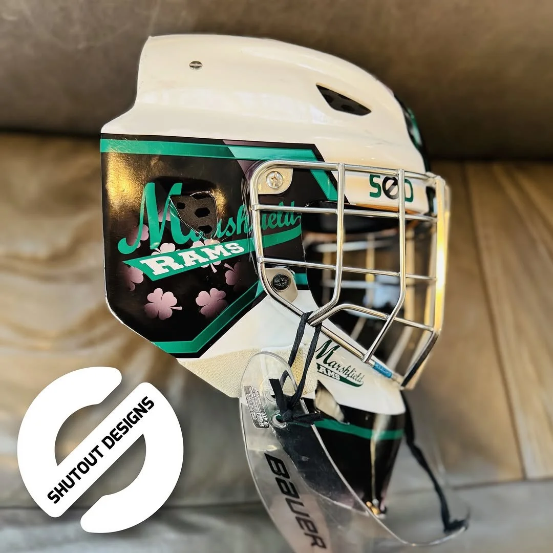 Green and black custom goalie mask decal kit by Shutout Designs - Clovers and rams