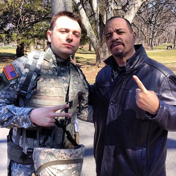 Behind-the-scenes photo of Patrick Murney with actor and rapper Ice-T on set.