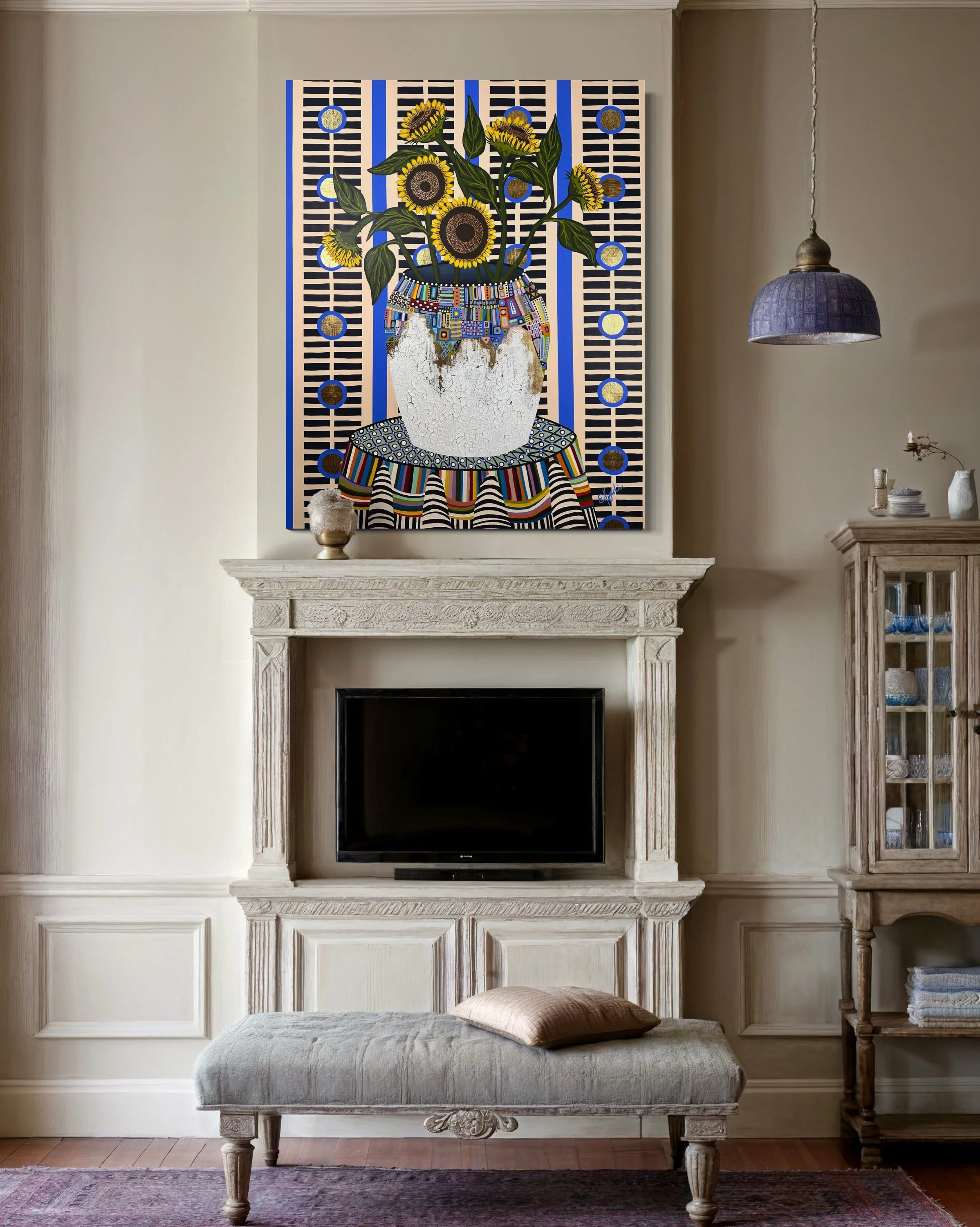 Large colorful floral abstract expressionism style painting with gold foil by Elizabeth Azadi, with a large crackled vase and large sunflowers in a traditional Living Room