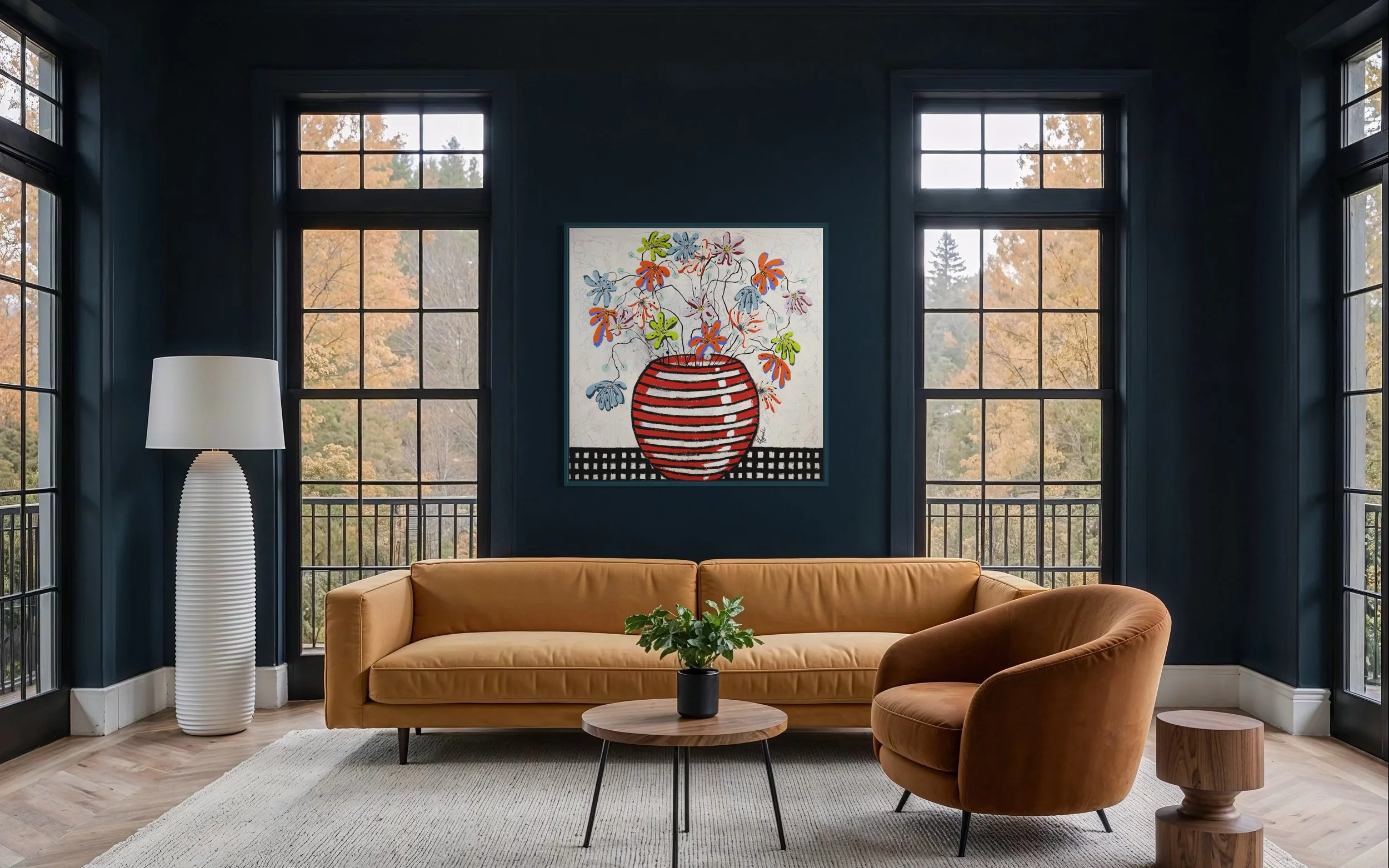 Large colorful floral abstract expressionism style painting by Elizabeth Azadi, expressive abstractions style, displayed in a modern navy blue living room with a camel colored sofa and wood furniture.