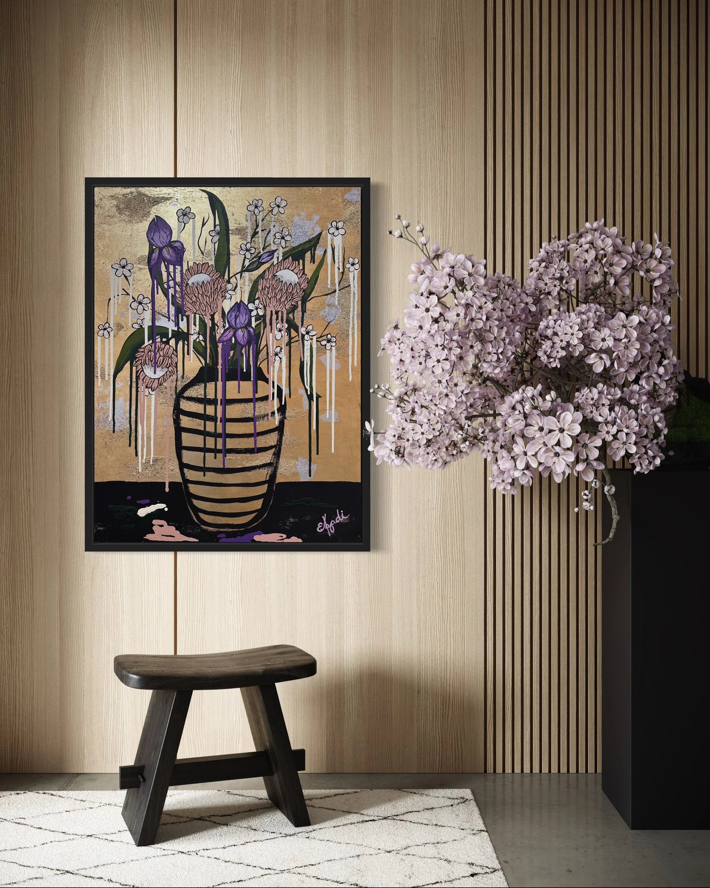 Large colorful floral abstract expressionism style painting with gold foil by Elizabeth Azadi, with a black striped vase and drippy flowers in a modern room with wood paneled walls and modern funiture