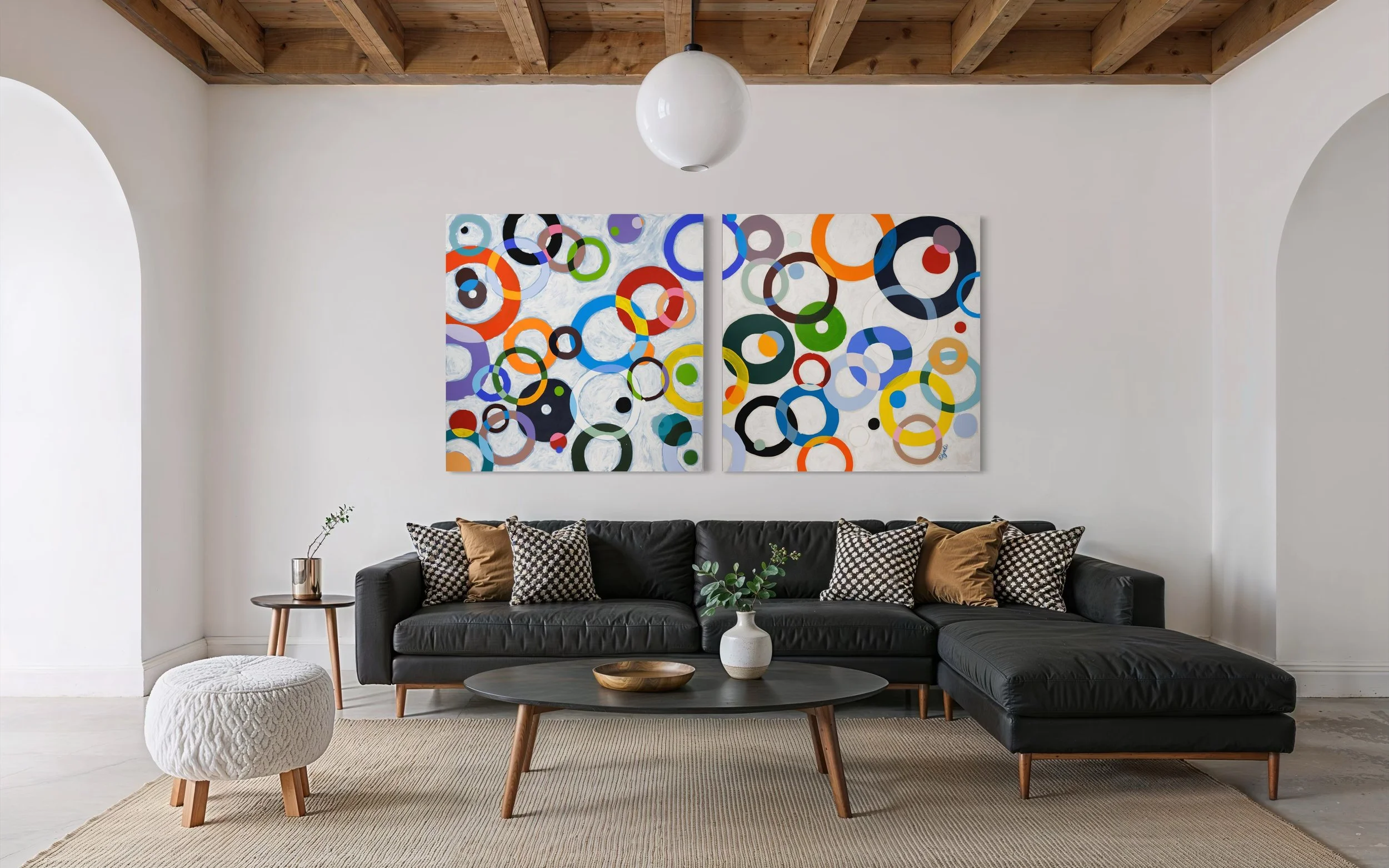 Large colorful abstract painting by Elizabeth Azadi, expressive abstractions style, displayed in a modern white living room.