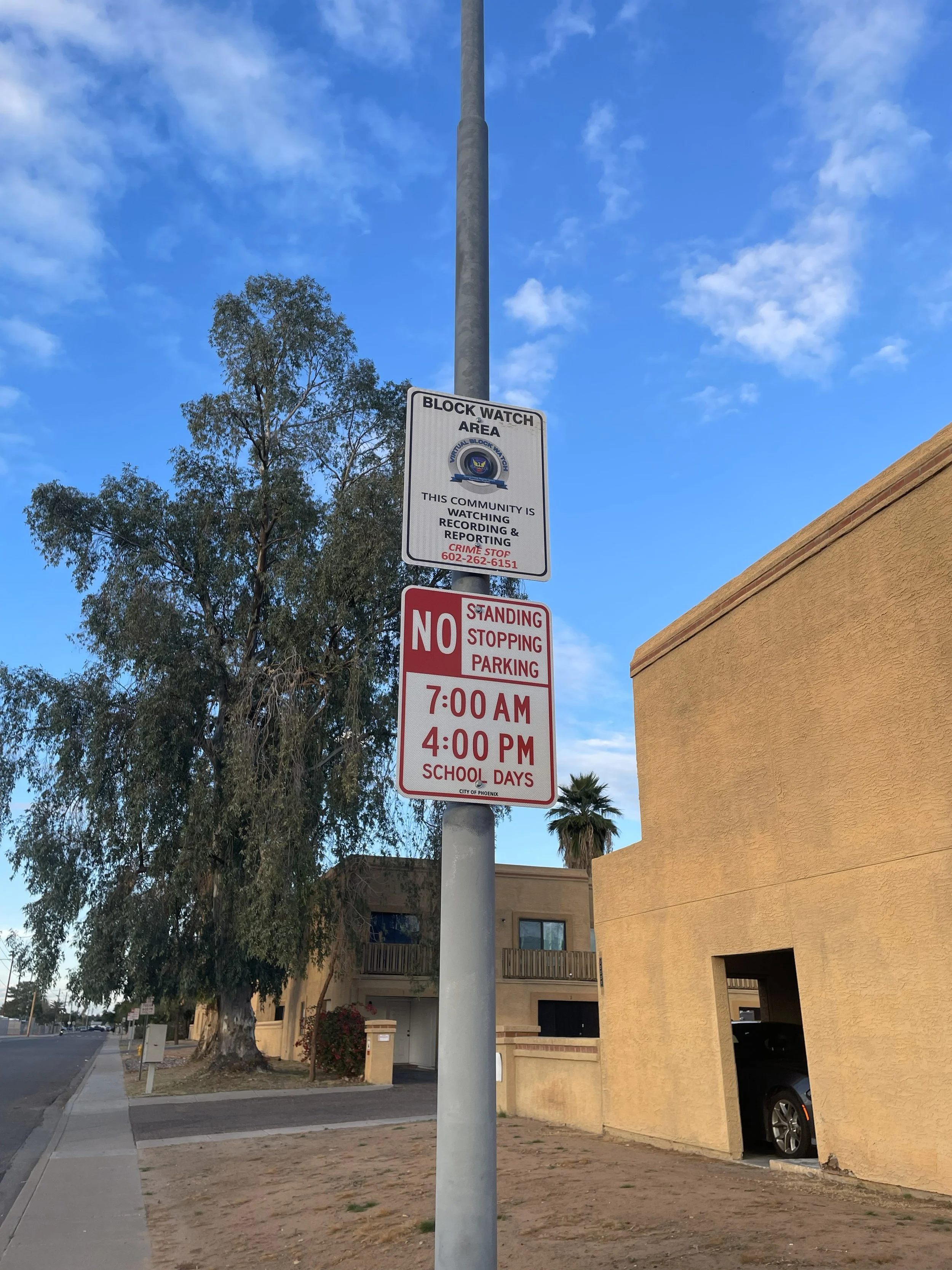 new block watch sign posted on street pole