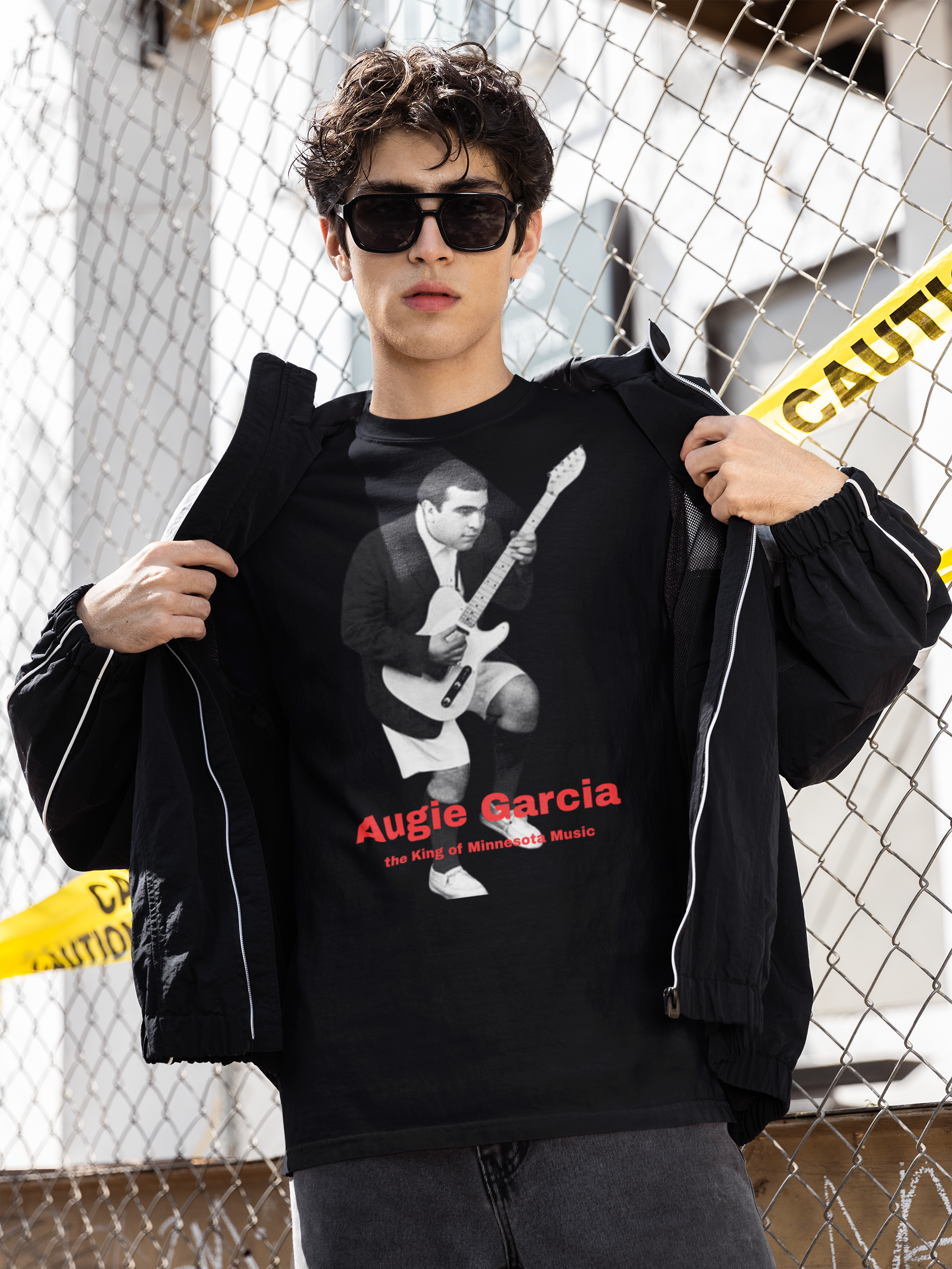 comfort-colors-t-shirt-mockup-of-a-man-with-dark-sunglasses-posing-against-a-net-fence-m55817 (1).png