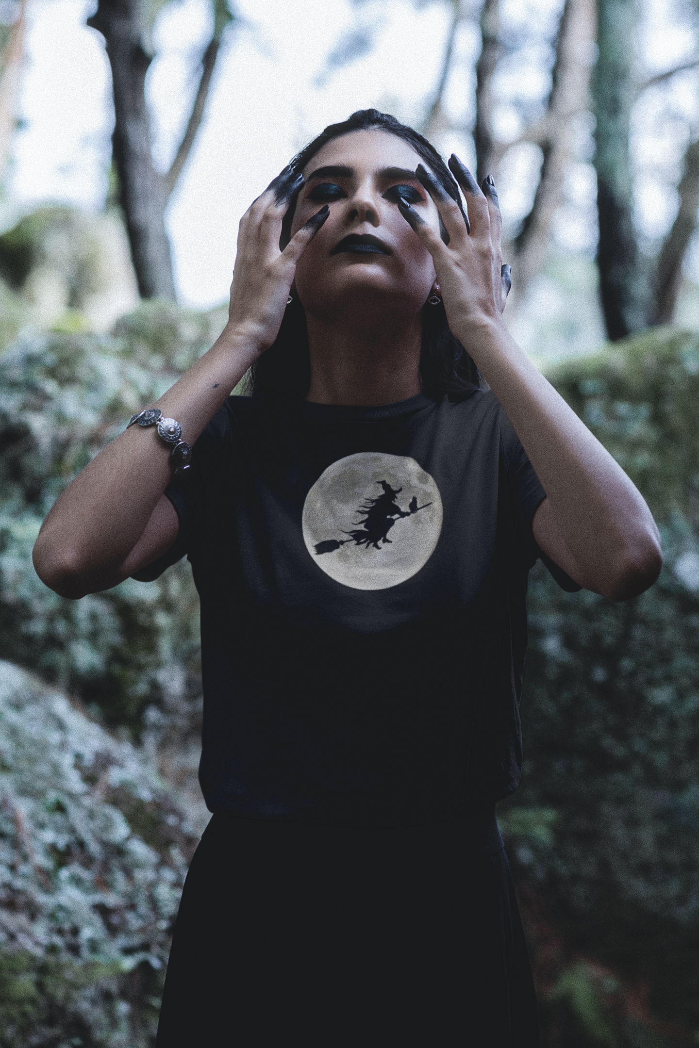 bella-canvas-t-shirt-featuring-a-woman-with-dark-eye-makeup-posing-in-a-wicca-setting-m29712 (1).png