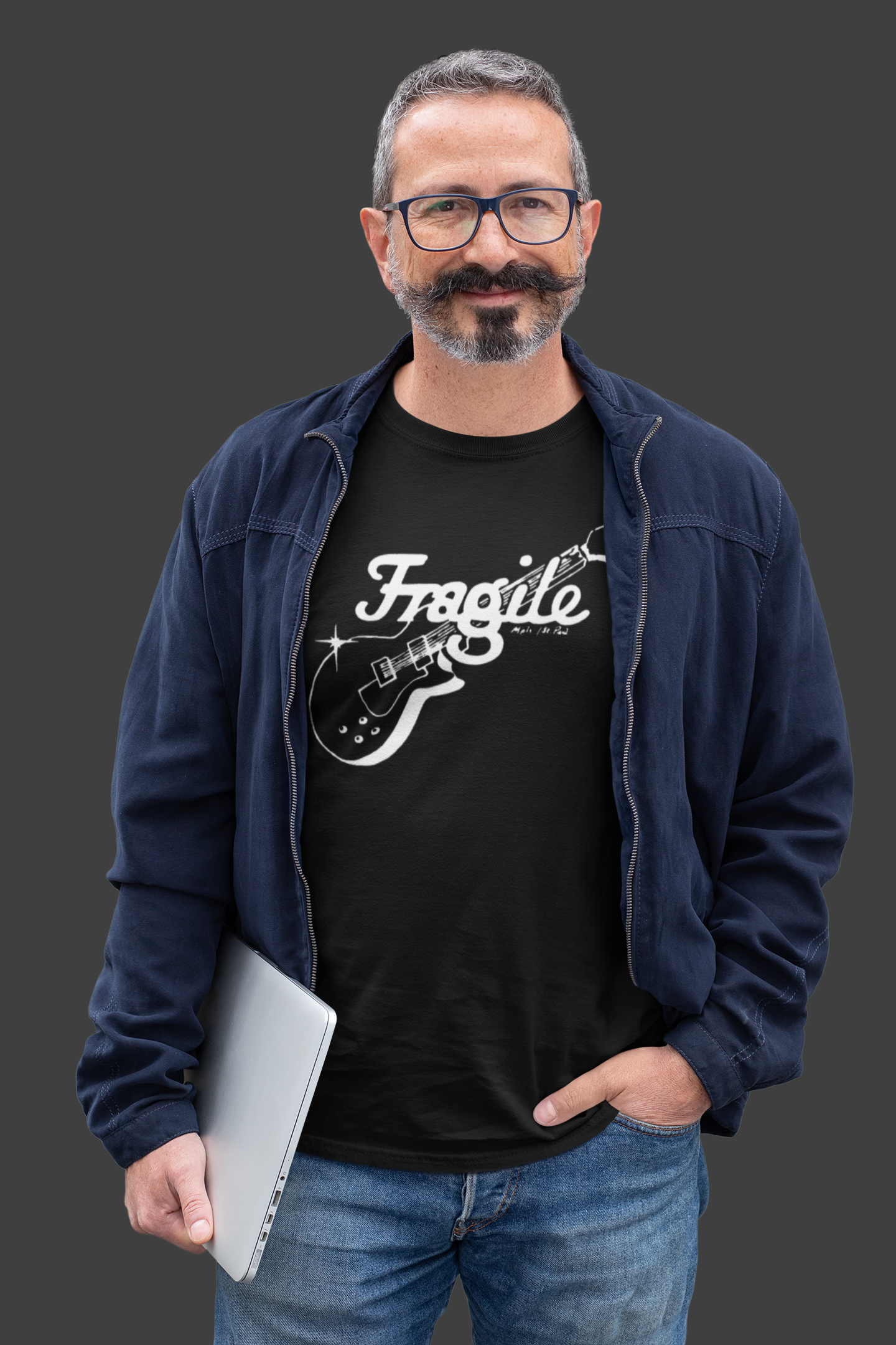 transparent-t-shirt-mockup-of-a-slick-middle-aged-man-holding-a-laptop-31714.png
