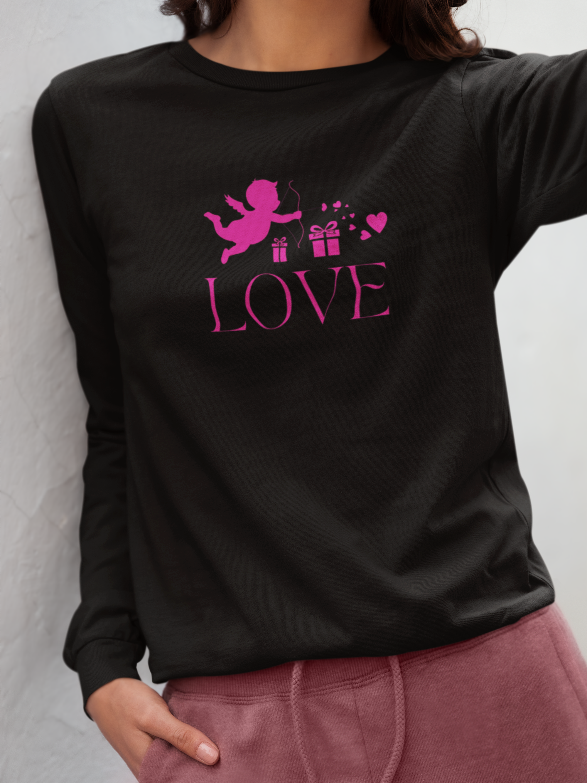 bella-canvas-long-sleeve-tee-mockup-featuring-a-cropped-face-woman-leaning-on-a-wall-m37312.png