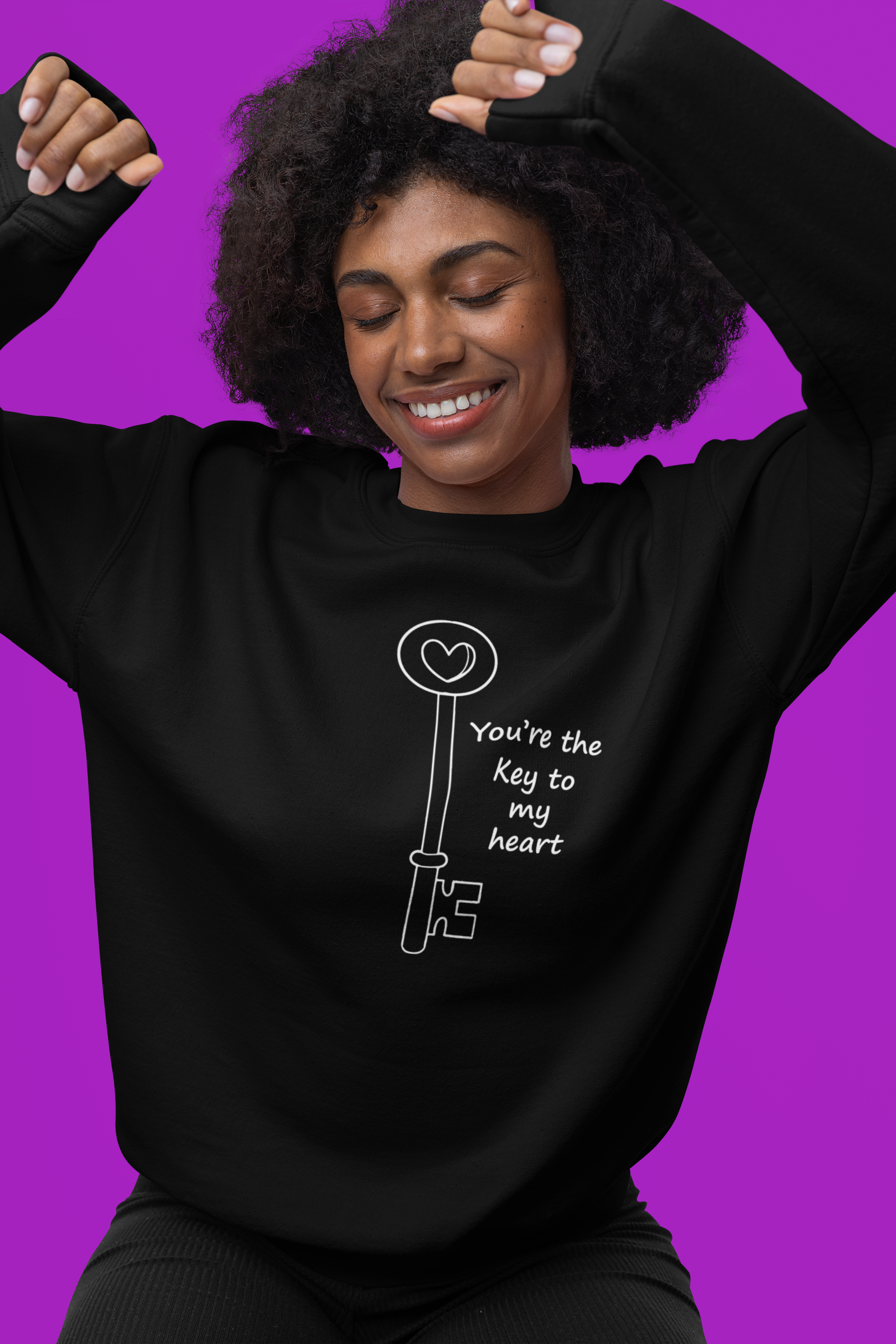 mockup-of-a-joyful-woman-with-curly-hair-wearing-a-gildan-pullover-hoodie-m37700.png