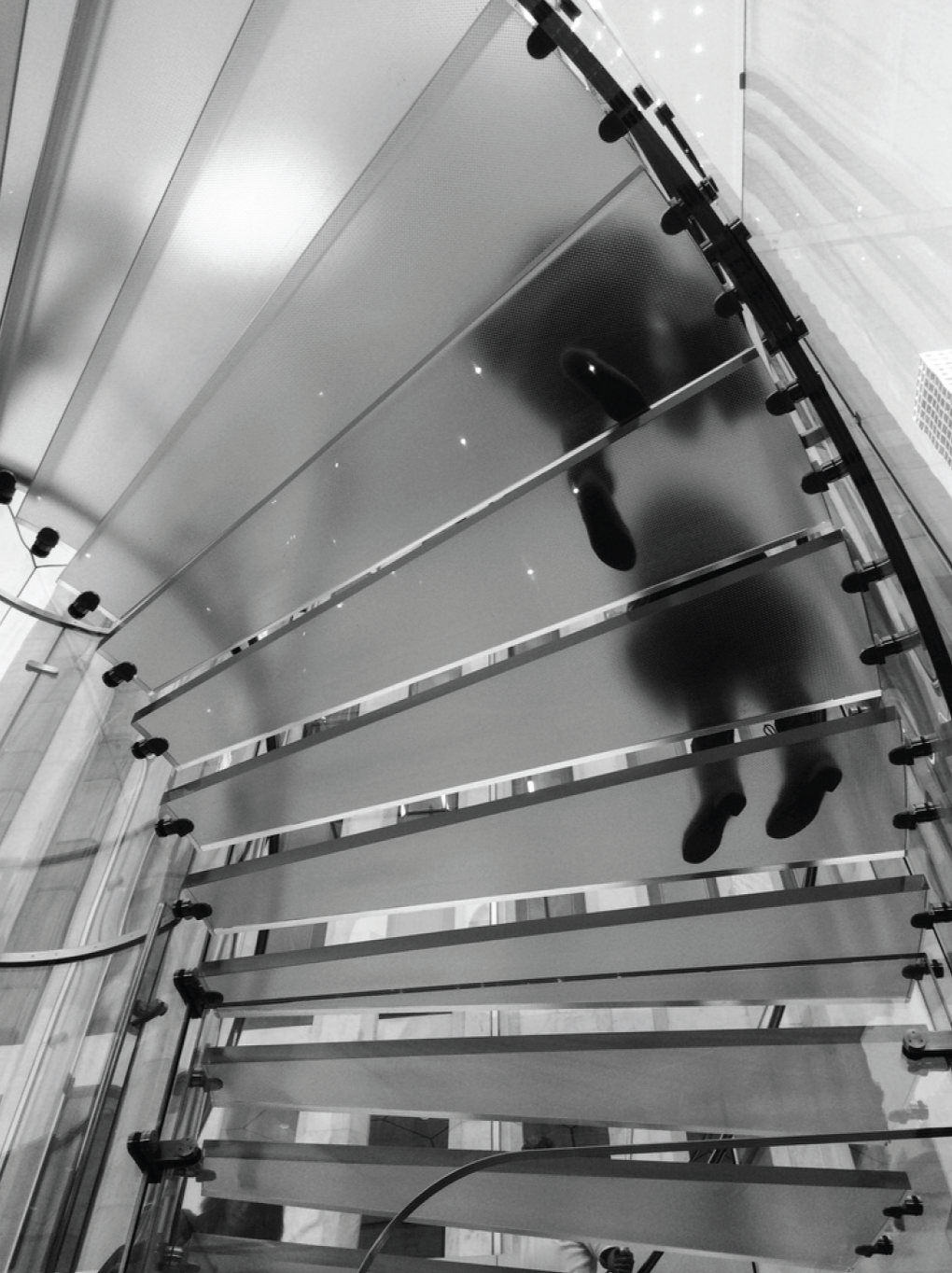 Black and White image of 2 people on stairs