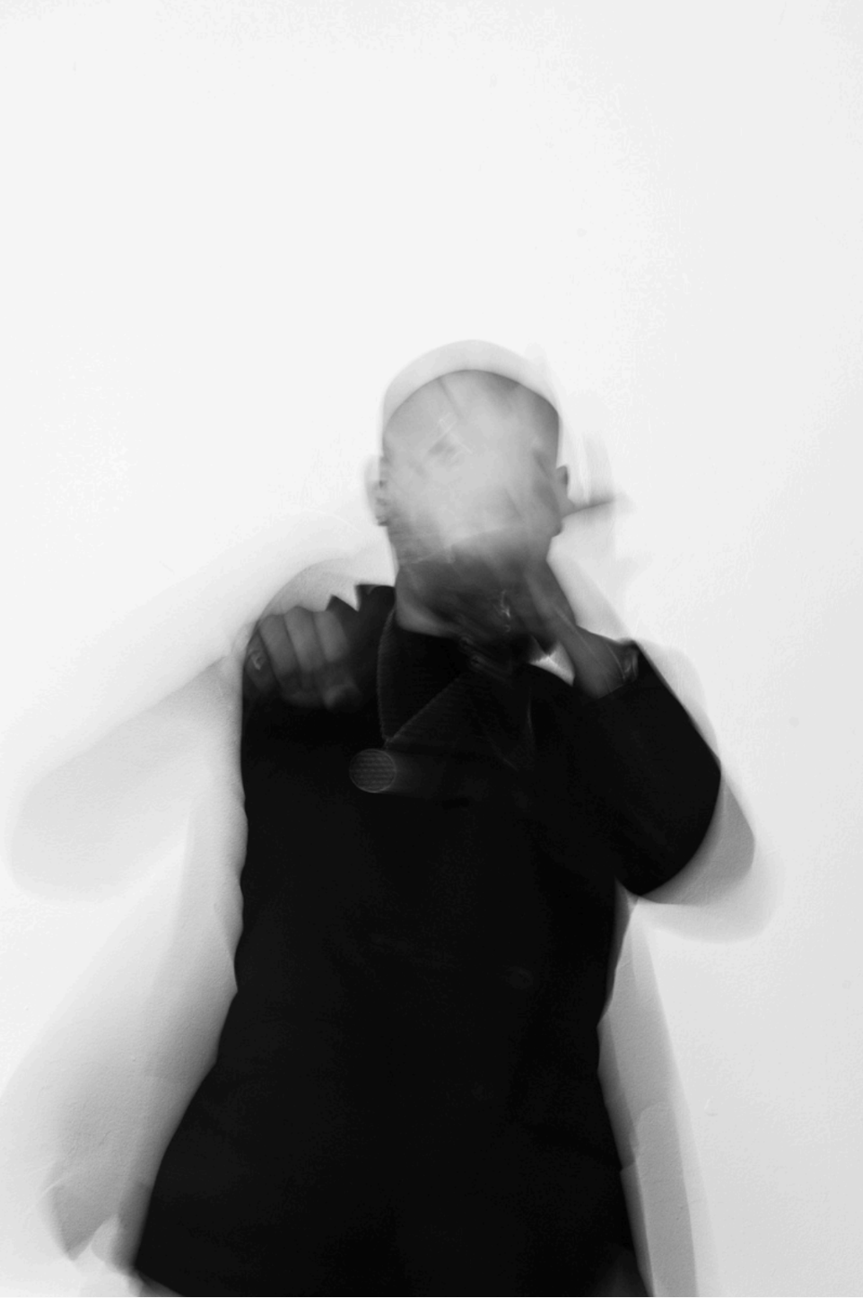 Black and White blurred image of person