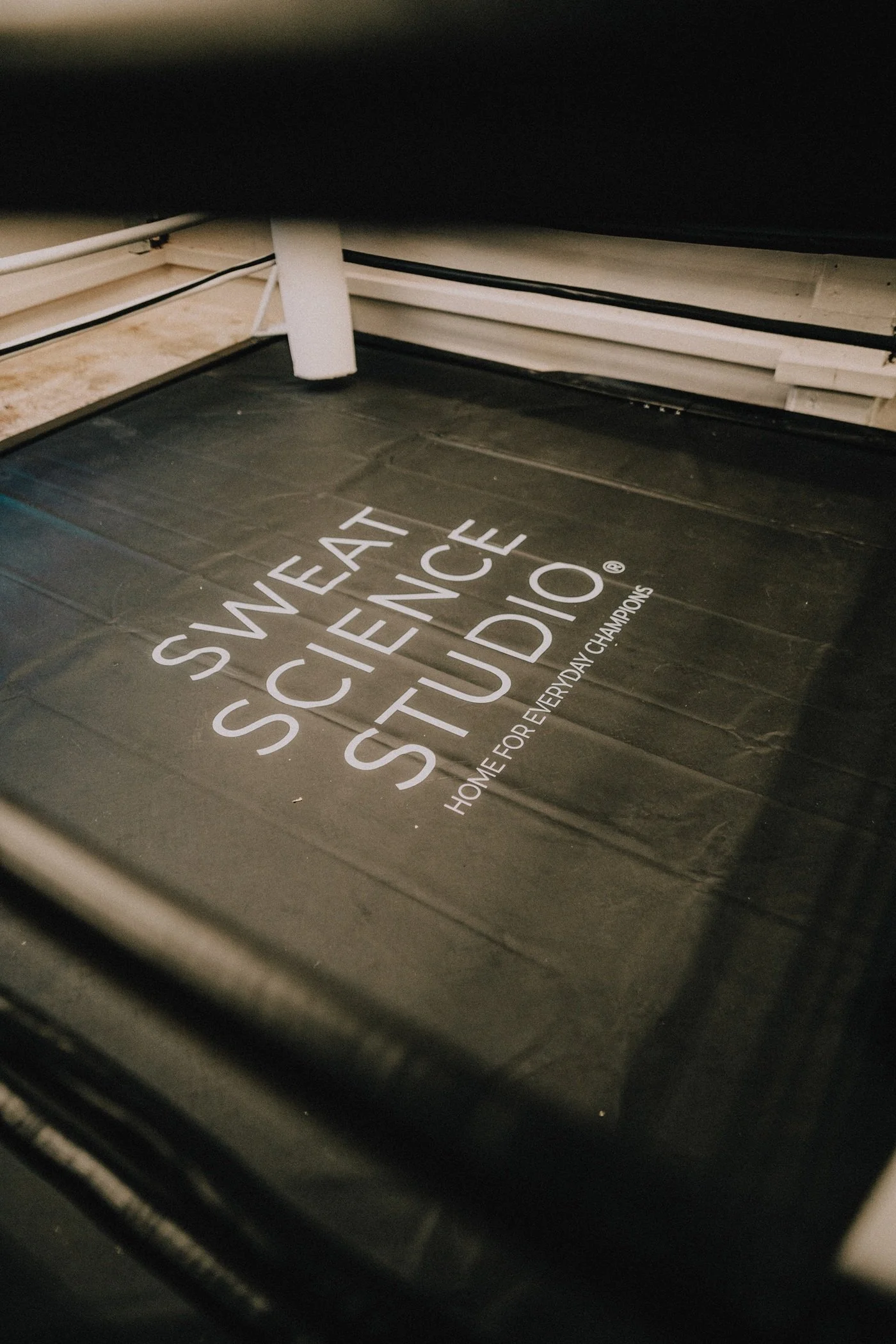 Sweat Science Studio boxing gym floor mat logo at Clarke Quay, Singapore