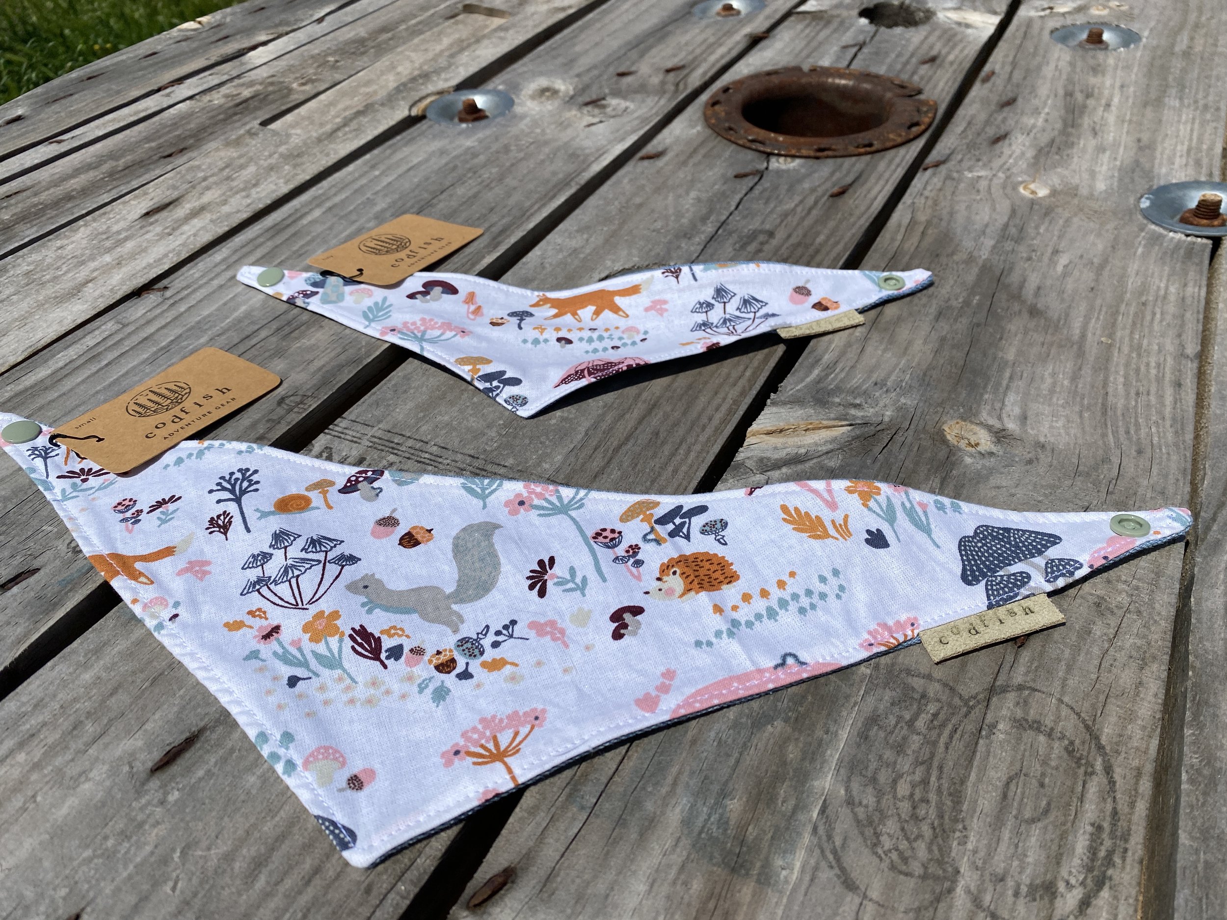 pink and blue rabbits, orange hedghogs, gray squirrels with flowers and mushrooms dog bandana