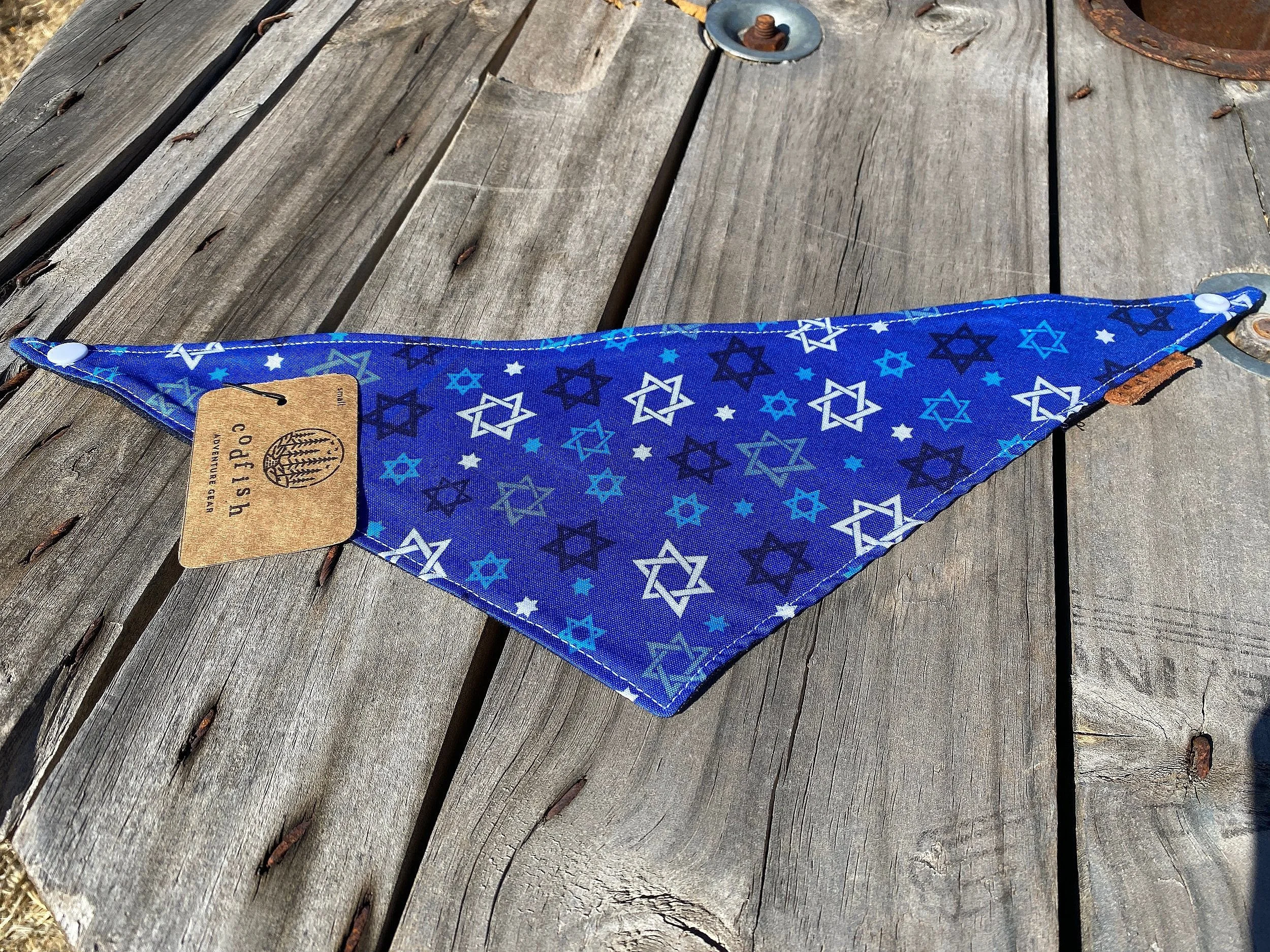 blue and white Hanukkah stars on blue background dog bandana