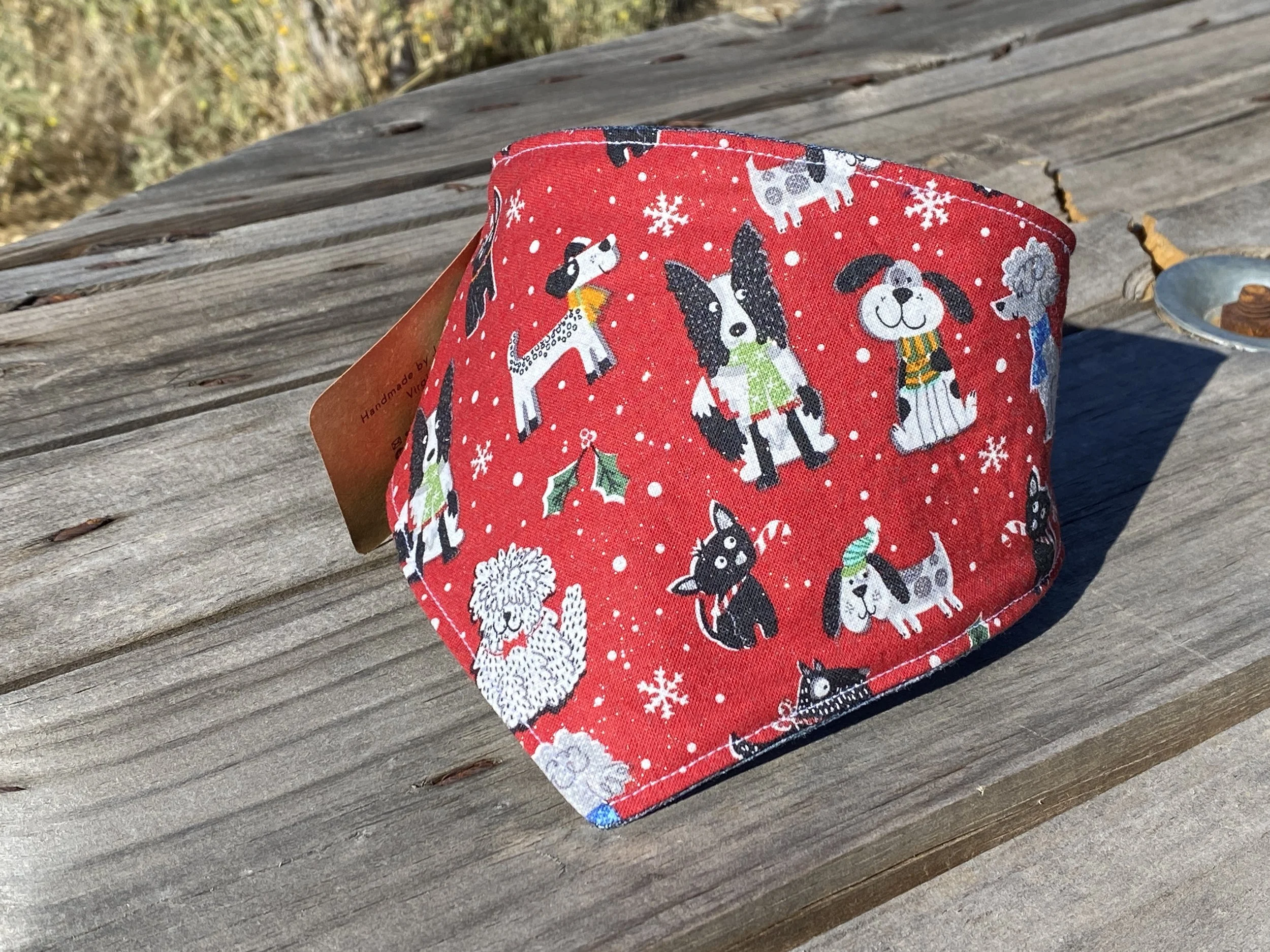 animated dogs dressed in winter outfits on red background dog bandana